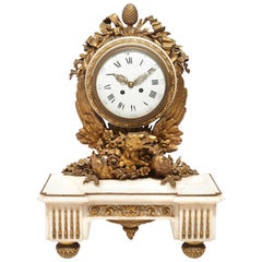 Reloj de chimenea francés de mármol ormolu, S. XIX