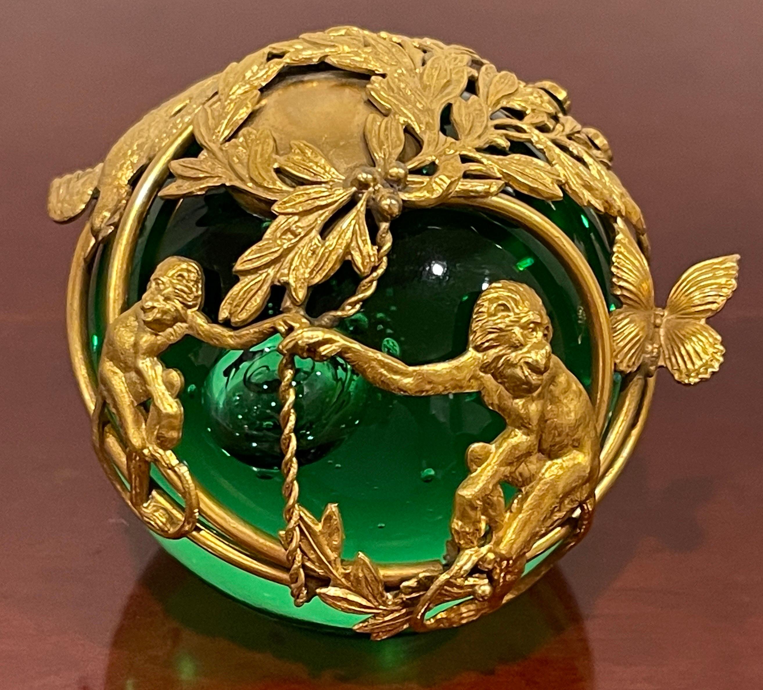 Cast French Ormolu Monkey Motif Green Crystal Controlled Bubble Paperweight For Sale