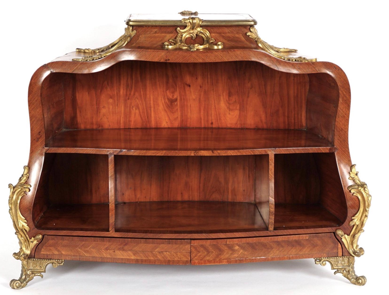 Very fine French Cartonnier, late 19th Century, Attributed to Francois Linke. Bombe form, parquetry inlaid case with applied fine ormolu decoration. Open shelf over segmented open shelf over two drawers.