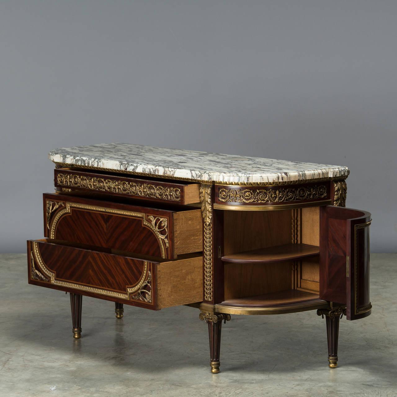 Louis XVI French Ormolu-Mounted Mahogany Commode after the Model by Jean-Francois Leleu