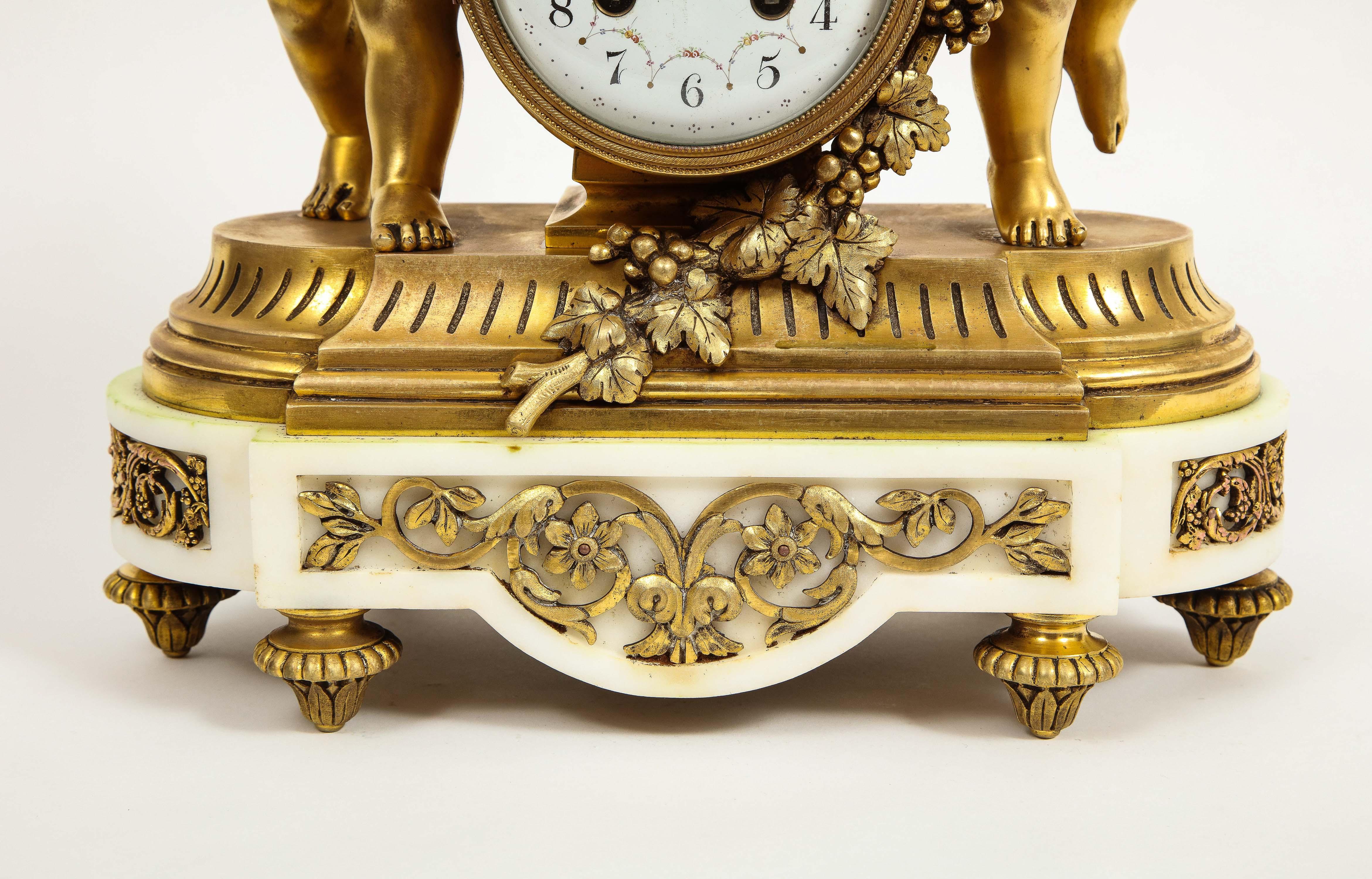 Napoleon III French Ormolu-Mounted White Marble Three Piece Clock Garniture, Clodion