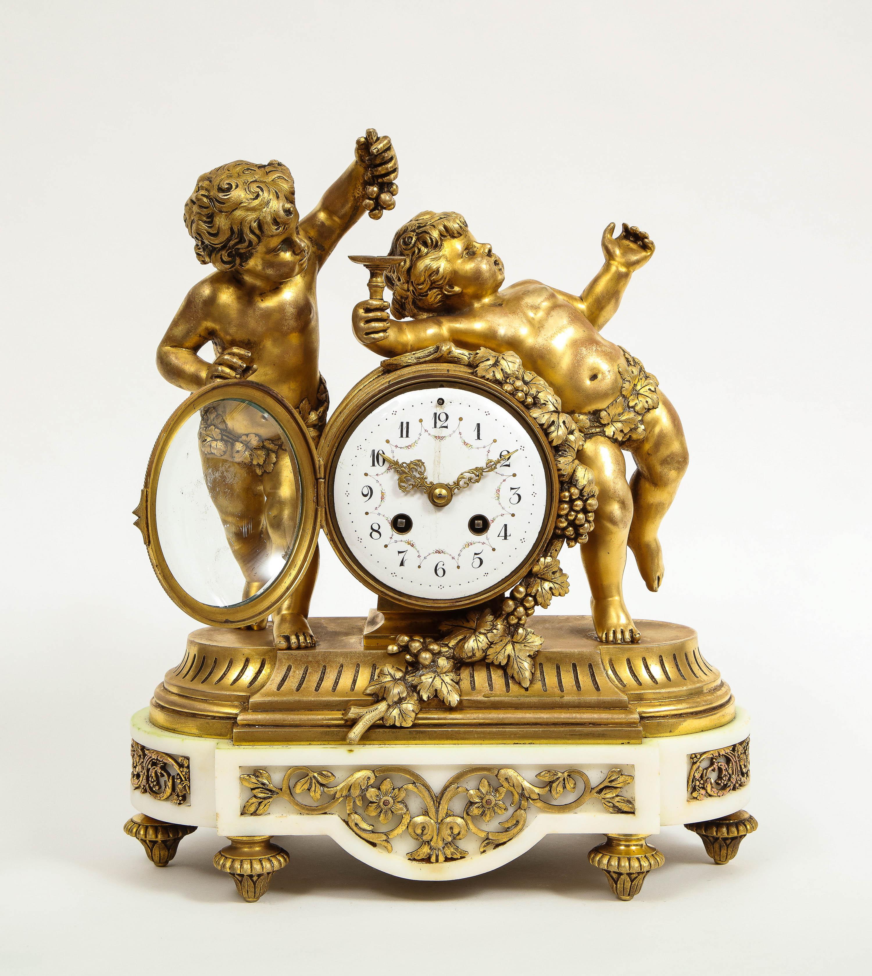 French Ormolu-Mounted White Marble Three Piece Clock Garniture, Clodion In Good Condition In New York, NY