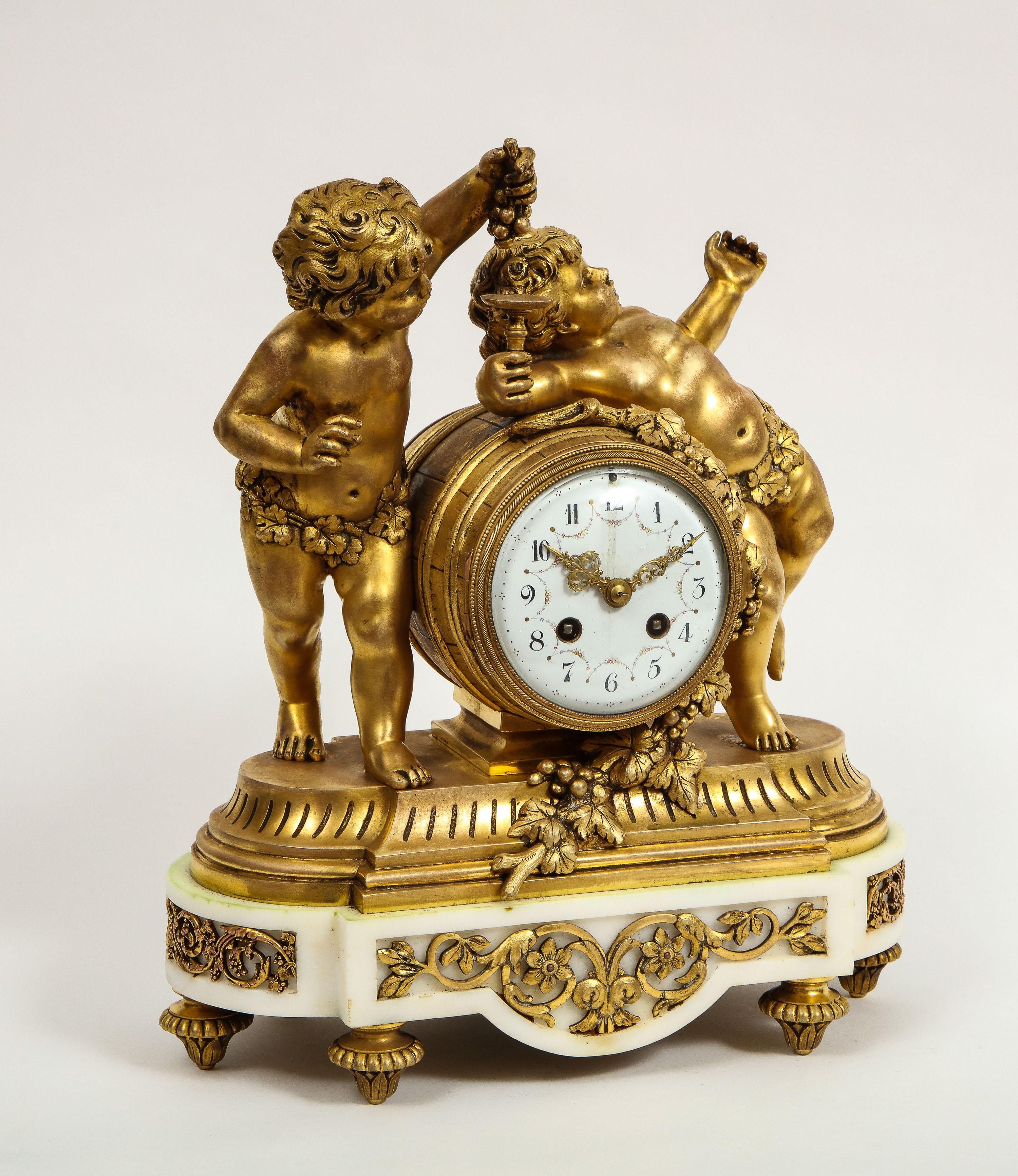 Bronze French Ormolu-Mounted White Marble Three Piece Clock Garniture, Clodion