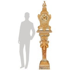 French Ormolu, Onyx and marble clock & pedestal, retailed by Camerden & Forster