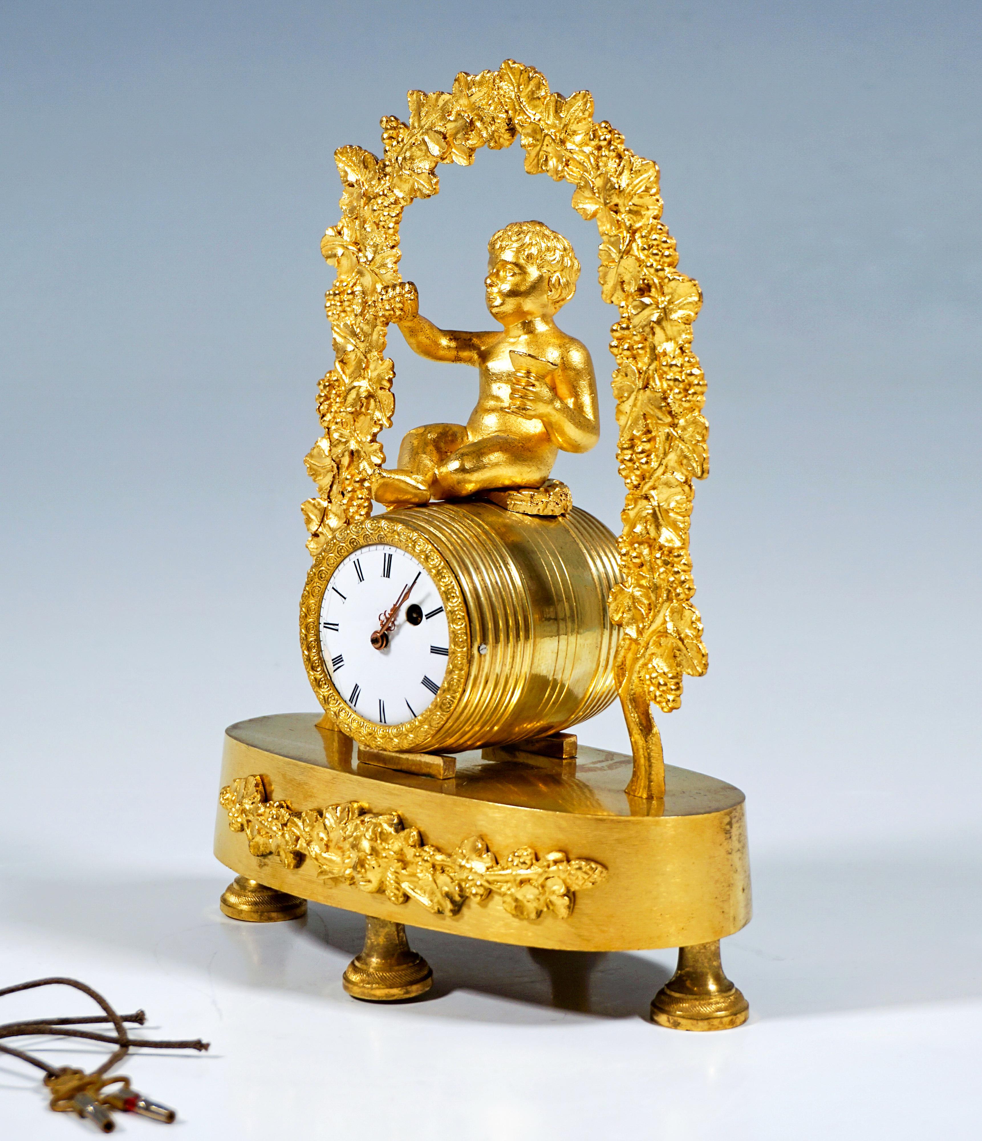 Empire French Ormolu Table Clock, Bacchant Sitting On Wine Barrel, Paris, Around 1840 For Sale