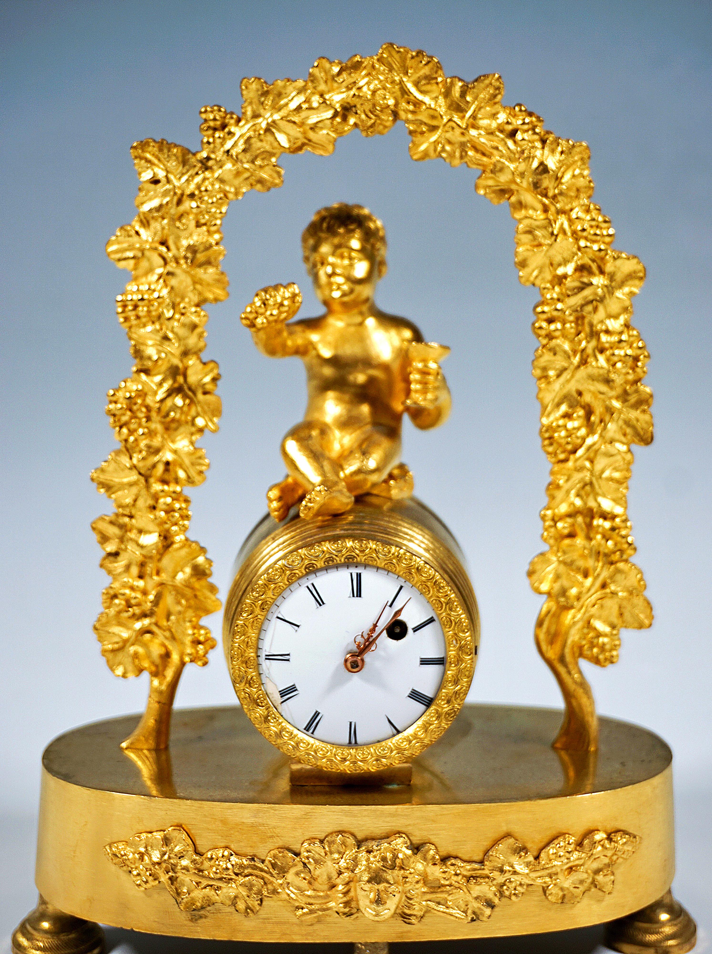 Gilt French Ormolu Table Clock, Bacchant Sitting On Wine Barrel, Paris, Around 1840 For Sale