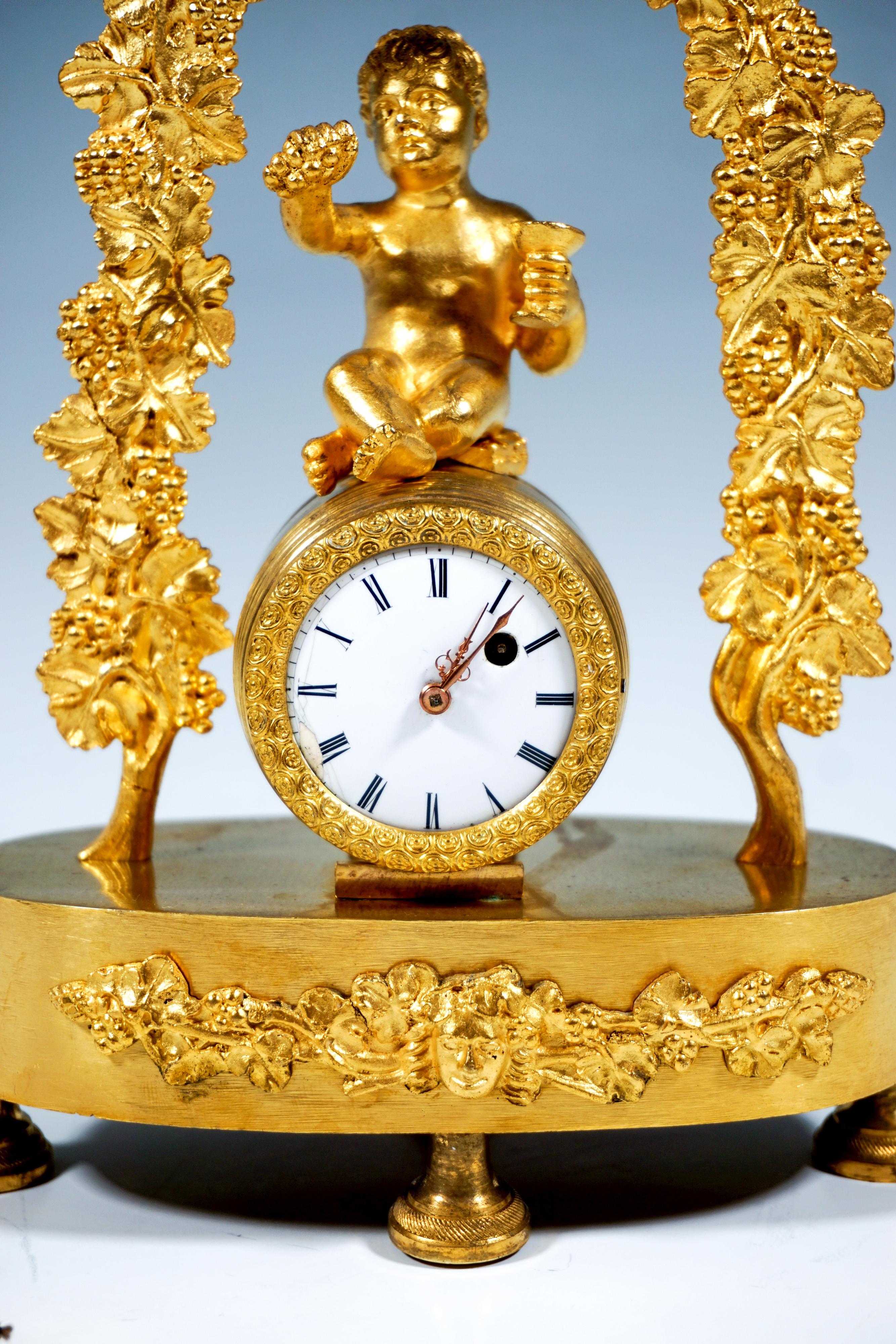 French Ormolu Table Clock, Bacchant Sitting On Wine Barrel, Paris, Around 1840 In Good Condition For Sale In Vienna, AT