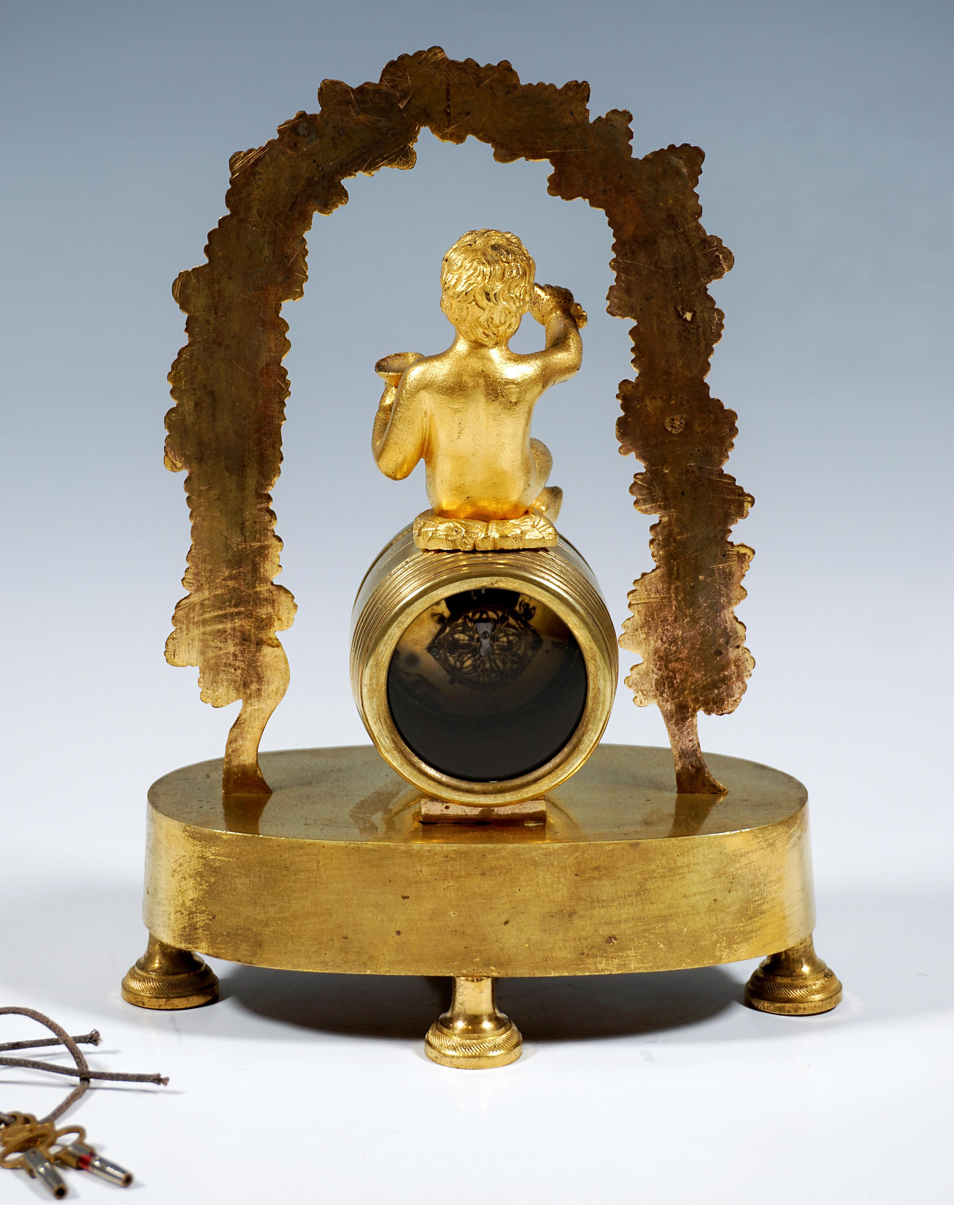 Mid-19th Century French Ormolu Table Clock, Bacchant Sitting On Wine Barrel, Paris, Around 1840 For Sale