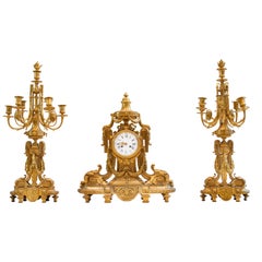 French Ormolu Three-Piece Clock Garniture by Ferdinand Barbedienne Antique French Ormolu Three-Piece Clock Garniture by Ferdinand Barbedienne
