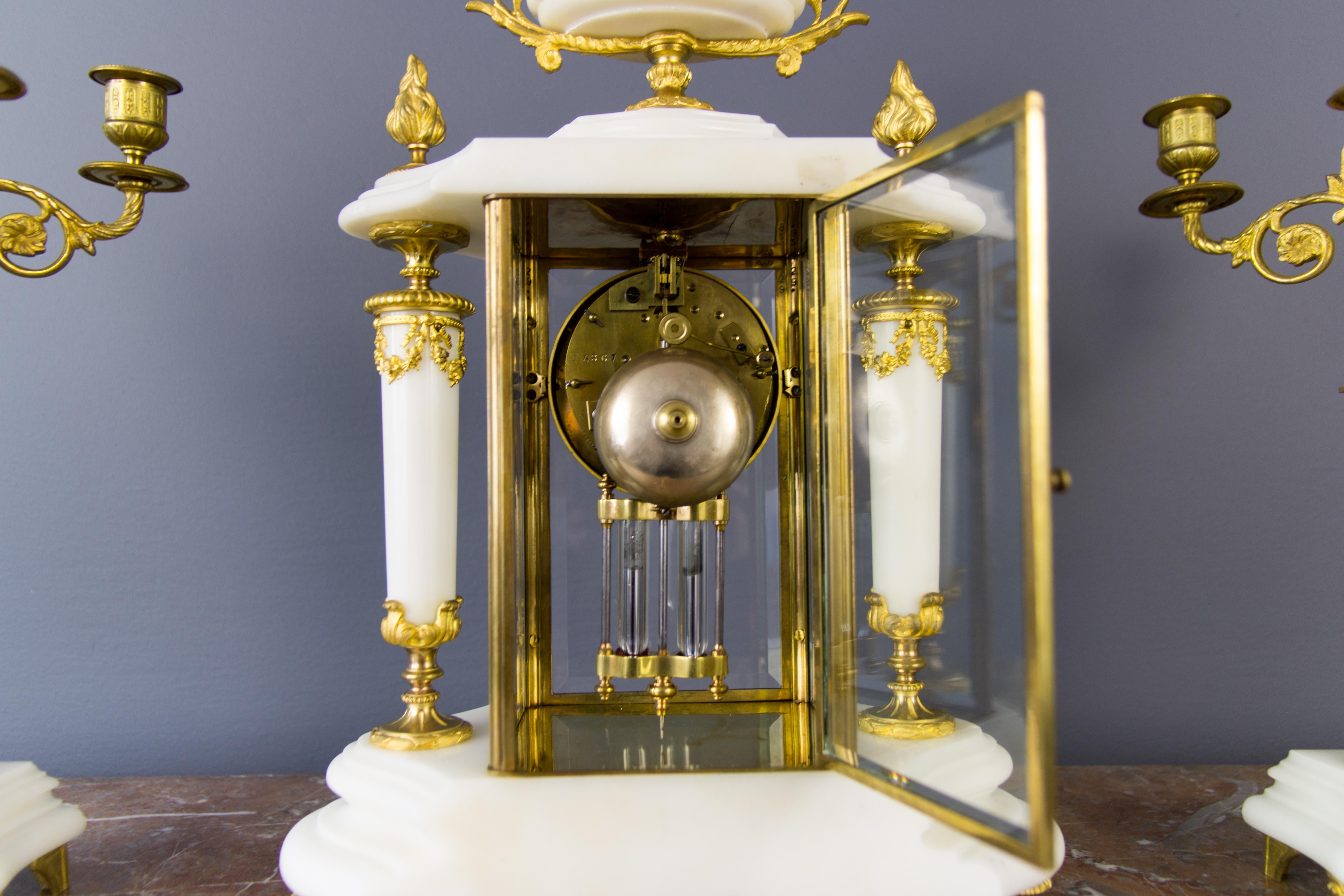 French Ormolu and White Marble Mantel Clock and Candelabra Set by A.D. Mougin 4