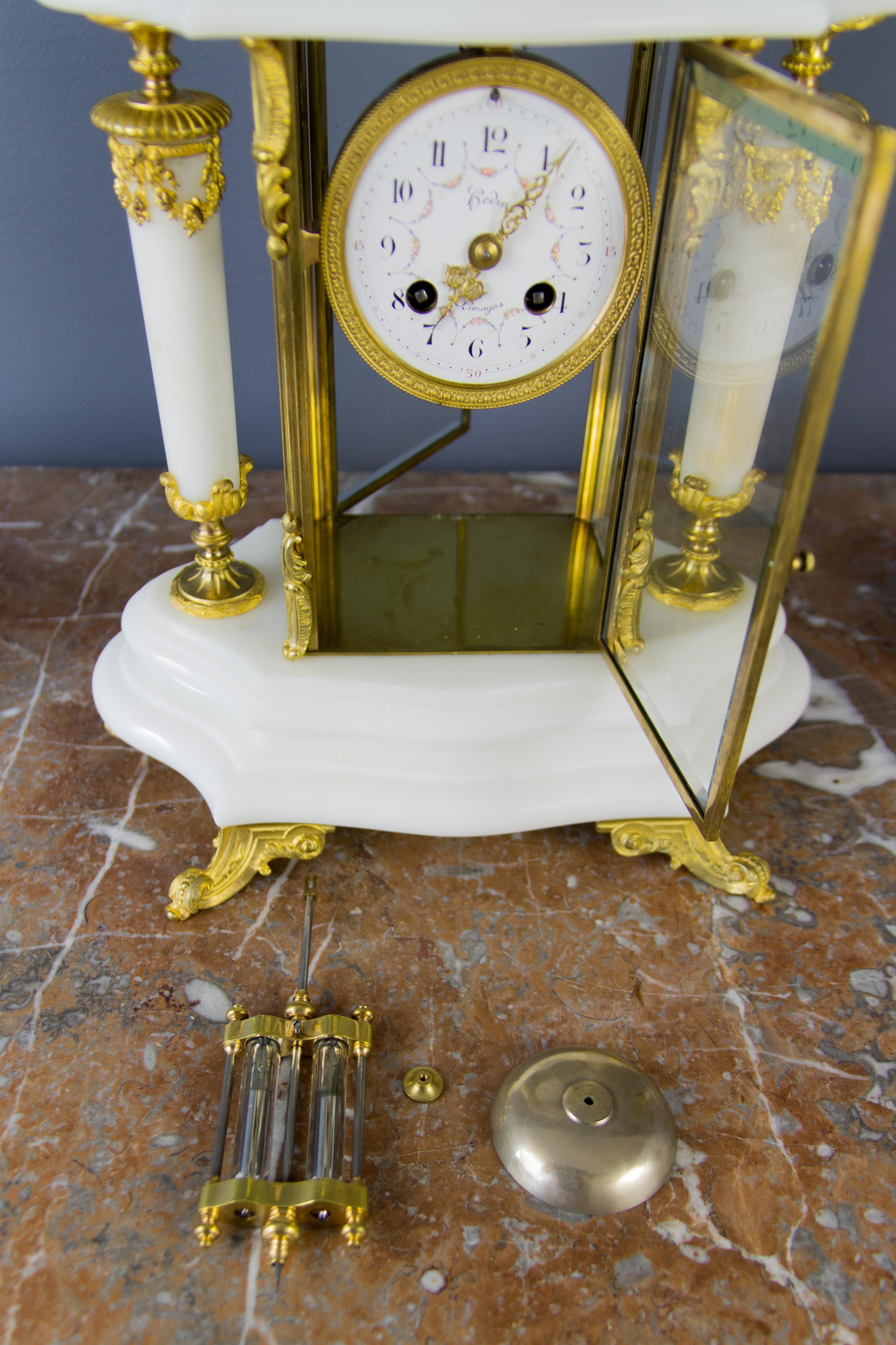 French Ormolu and White Marble Mantel Clock and Candelabra Set by A.D. Mougin 5