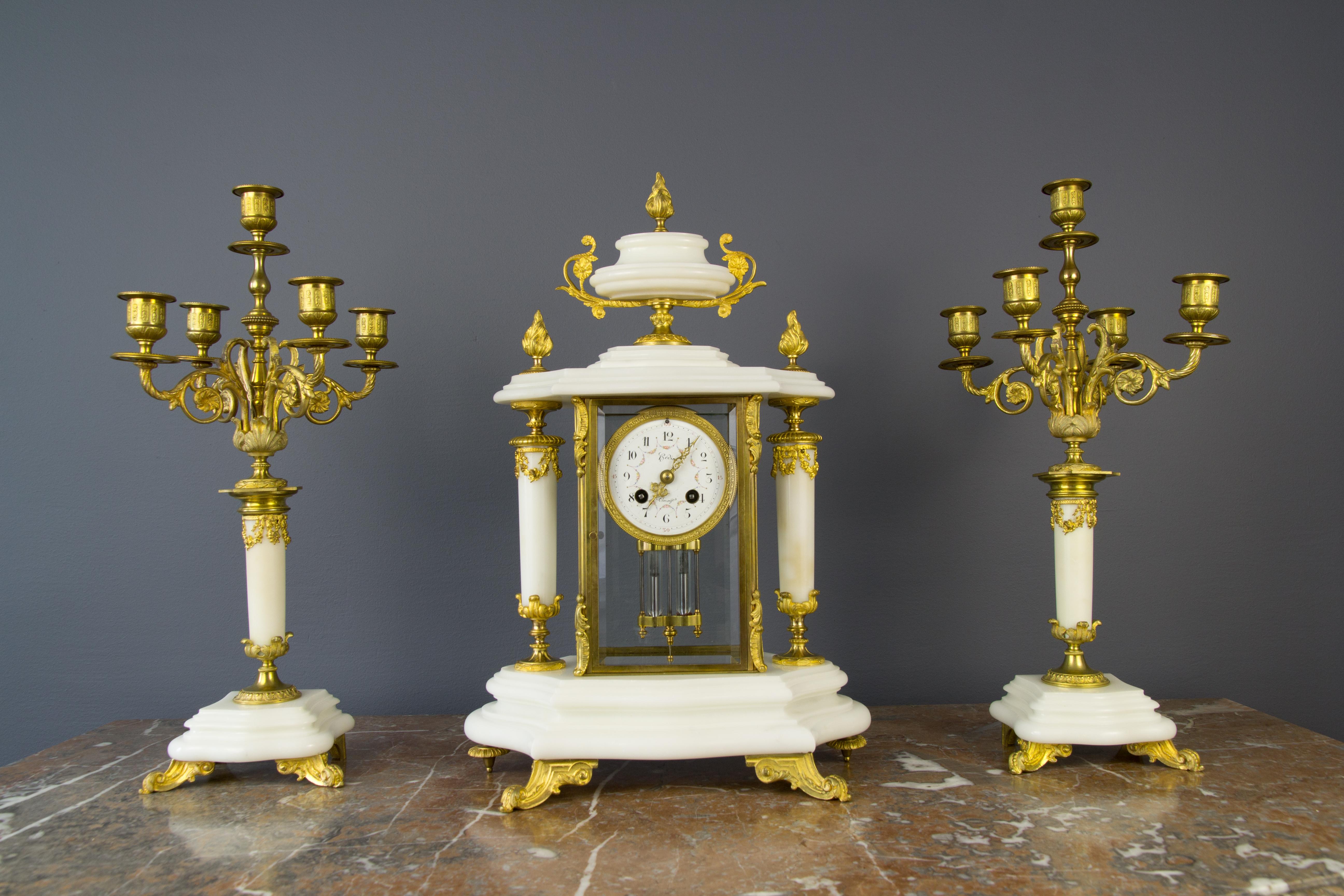 French Ormolu and White Marble Mantel Clock and Candelabra Set by A.D. Mougin 6