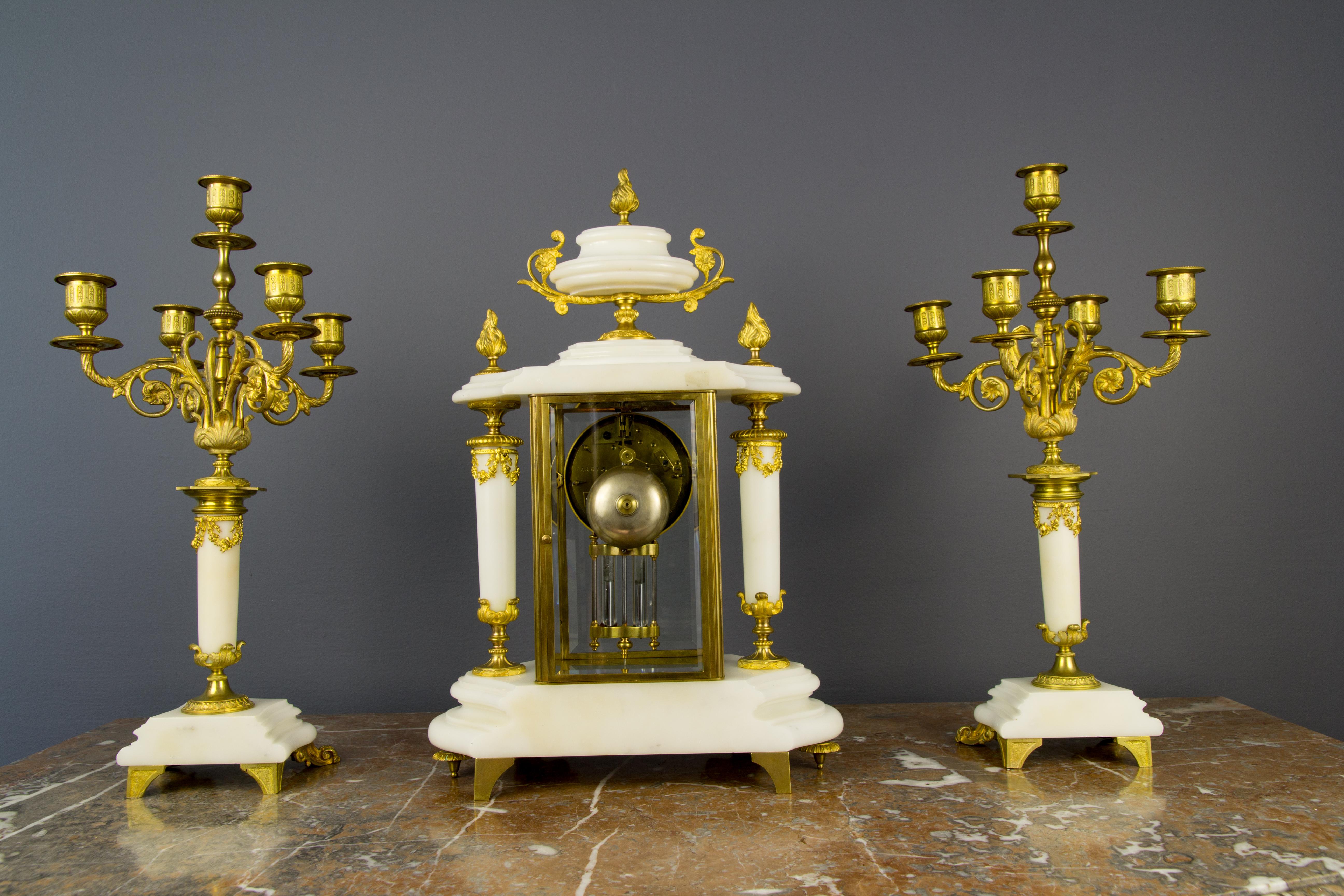 French Ormolu and White Marble Mantel Clock and Candelabra Set by A.D. Mougin 9