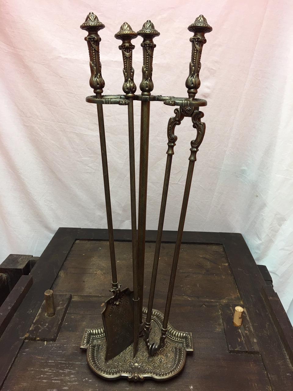 French Ornate three-piece fire tool set, 20th century.
