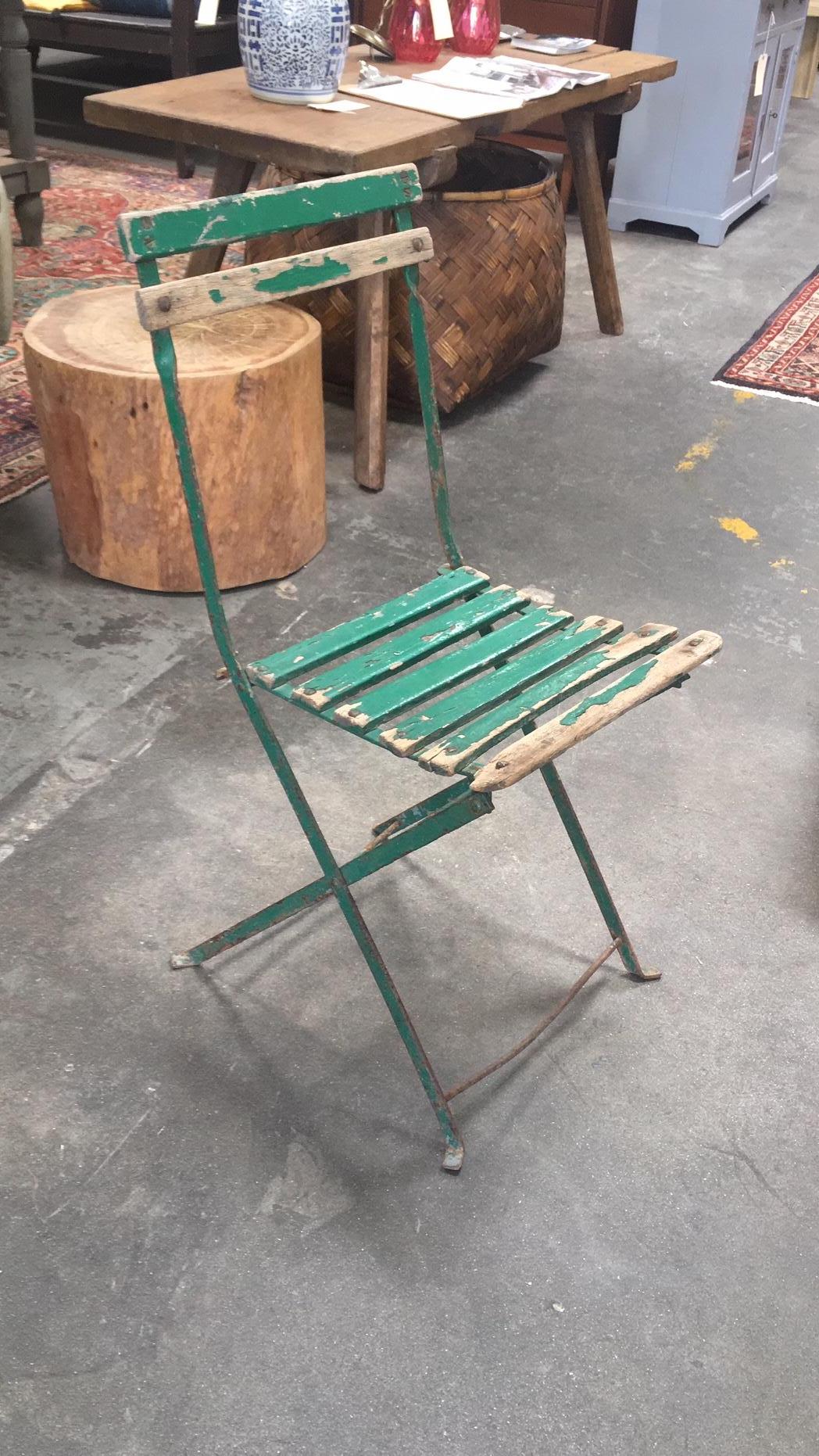 Vintage set of traditional French garden seats. From the 1950s. Made of wood and metal. Paint is chipping but that is typical with the age of these chairs.