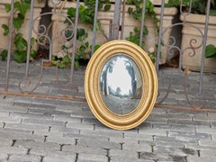 French Oval Convex Wall Mirror with Giltwood Frame, circa 1920