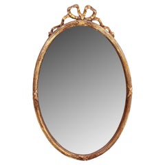 Antique French Oval Gilt Mirror with Bow Crown, Early 20th Century