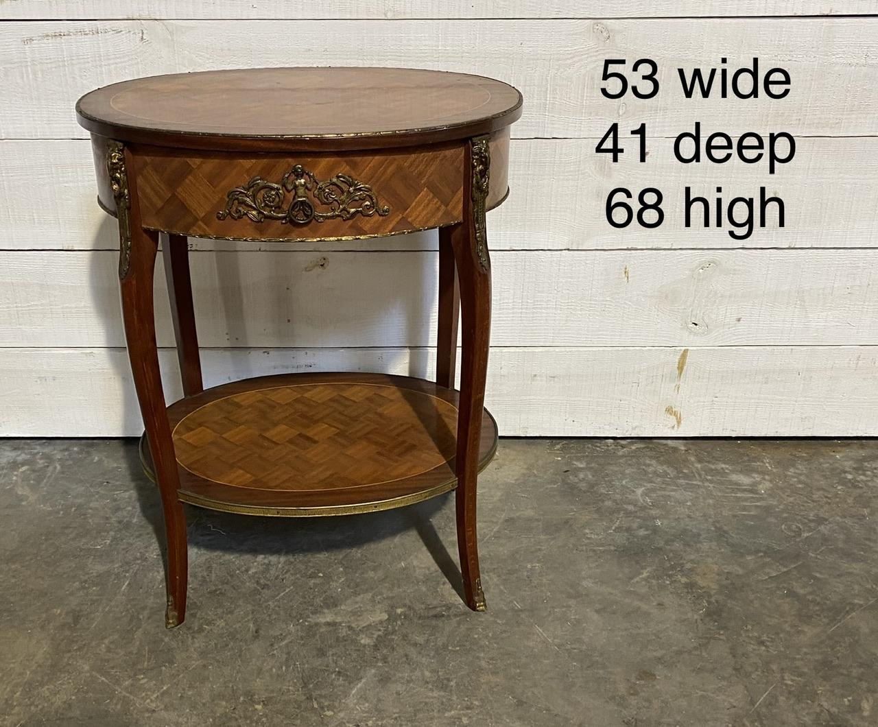 A pretty French lamp or occasional table, made from mahogany with nice mounts and a single drawer to the front.
In excellent original condition for the home.
Measures: Width 53 cm
Depth 41 cm
Height 68 cm.