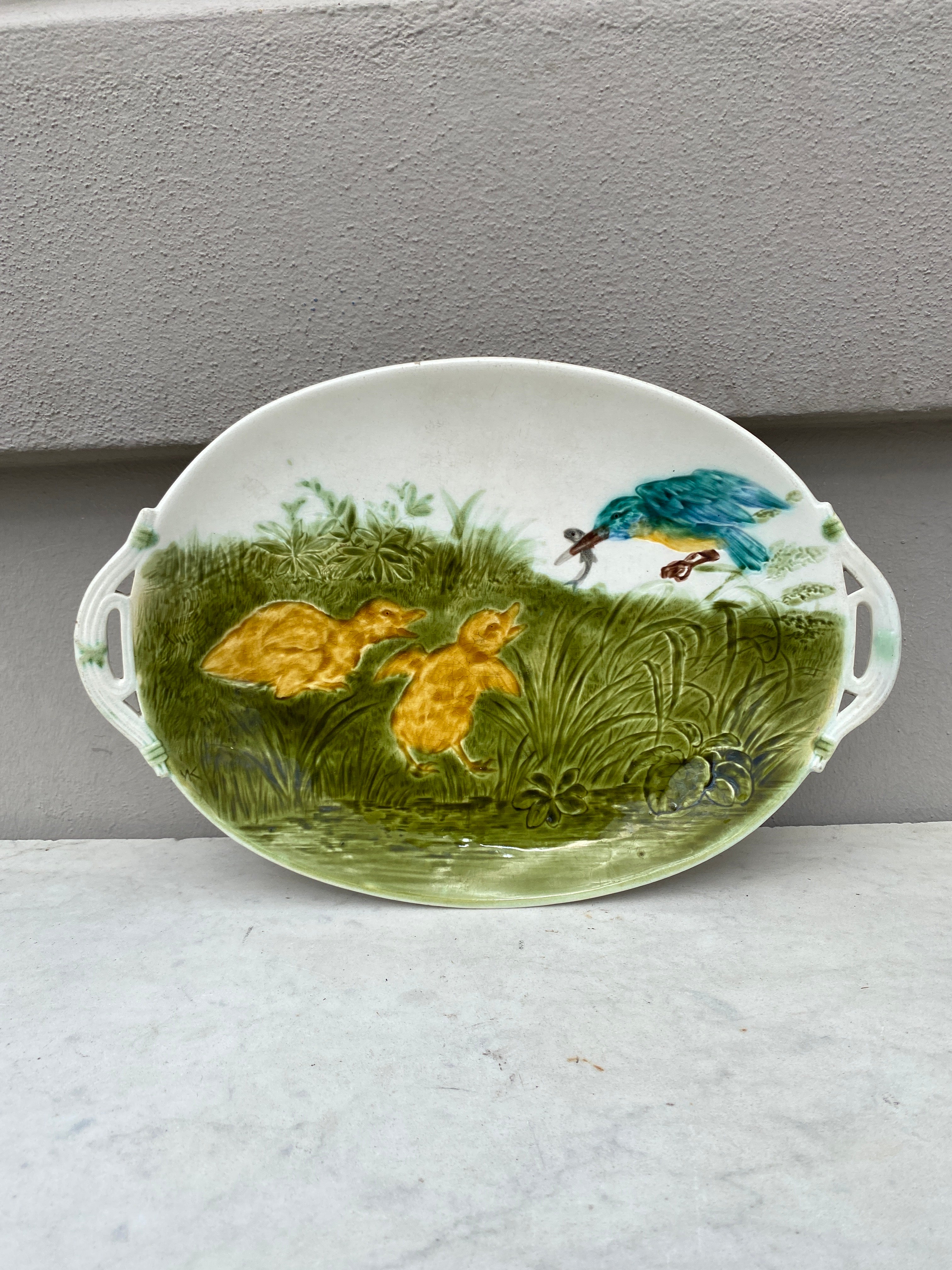French oval Majolica ducklings and kingfisher platter signed Sarreguemines, circa 1890.