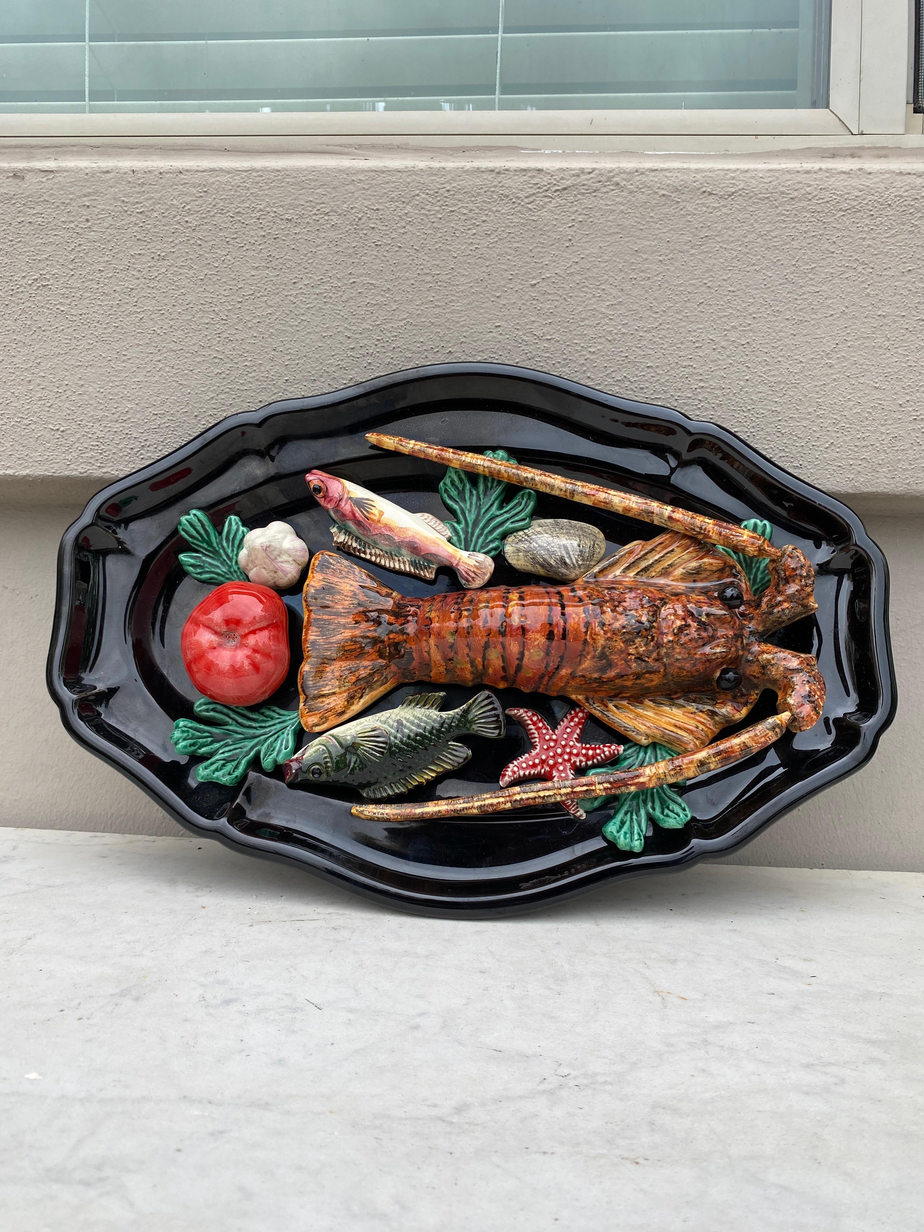French Oval Majolica Palissy Fish & Lobster Platter Vallauris, circa 1950.
Fishs,tomato,garlic,starfish,seaweeds,shells.
From Provence.
Length / 16.5 inches by 11 inches, height / 3 inches.
 