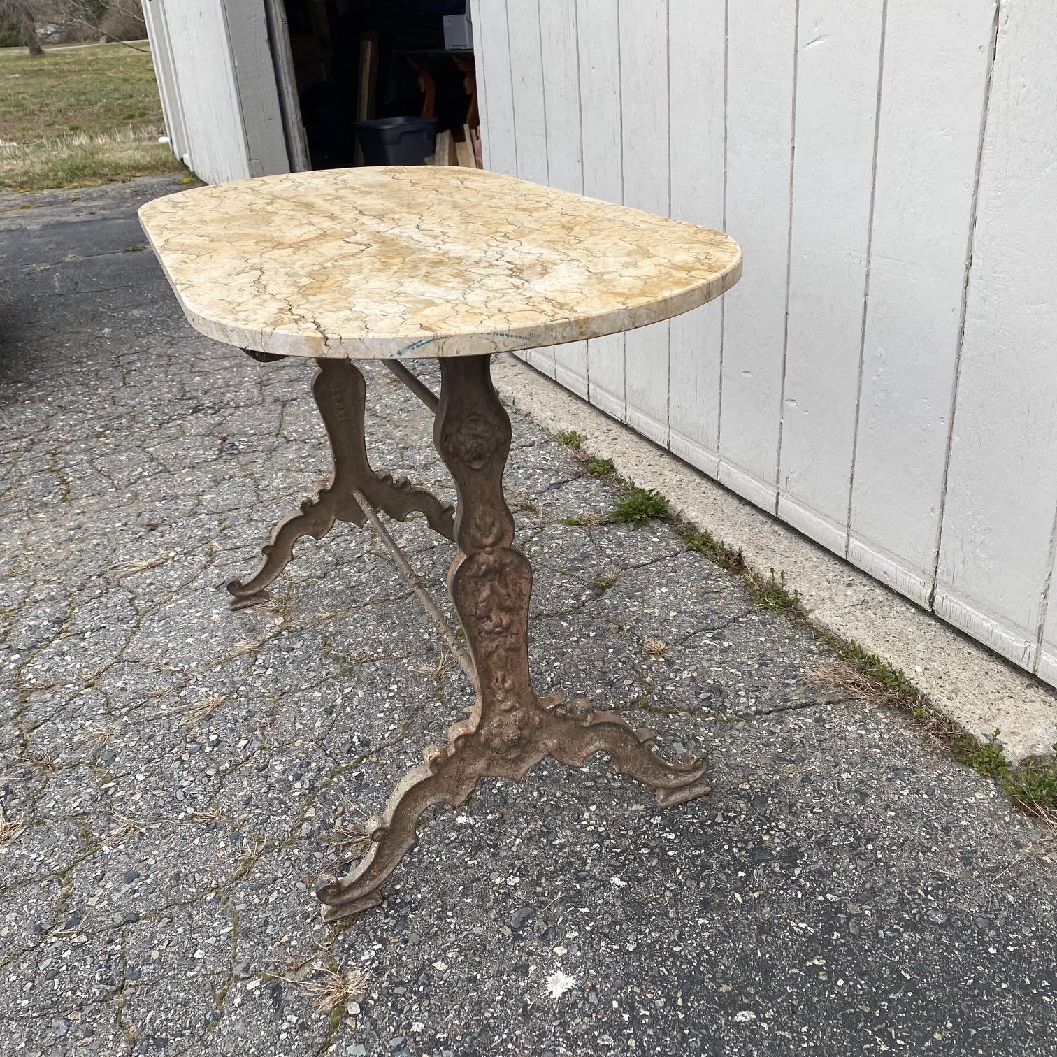 French Oval Marble Top Cafe Table with Exceptional Metal Base  For Sale 11