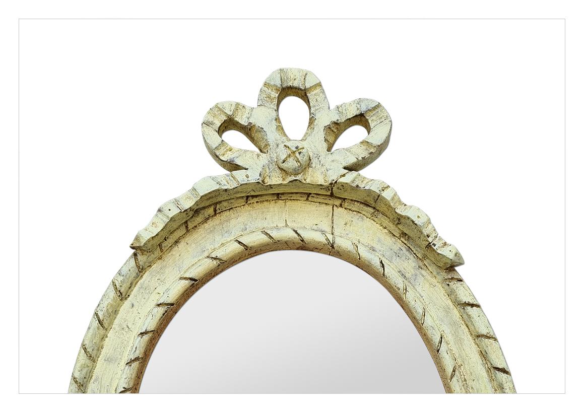 French Provincial French Oval Mirror In Light Yellow Carved Wood From Provence, circa 1950 For Sale