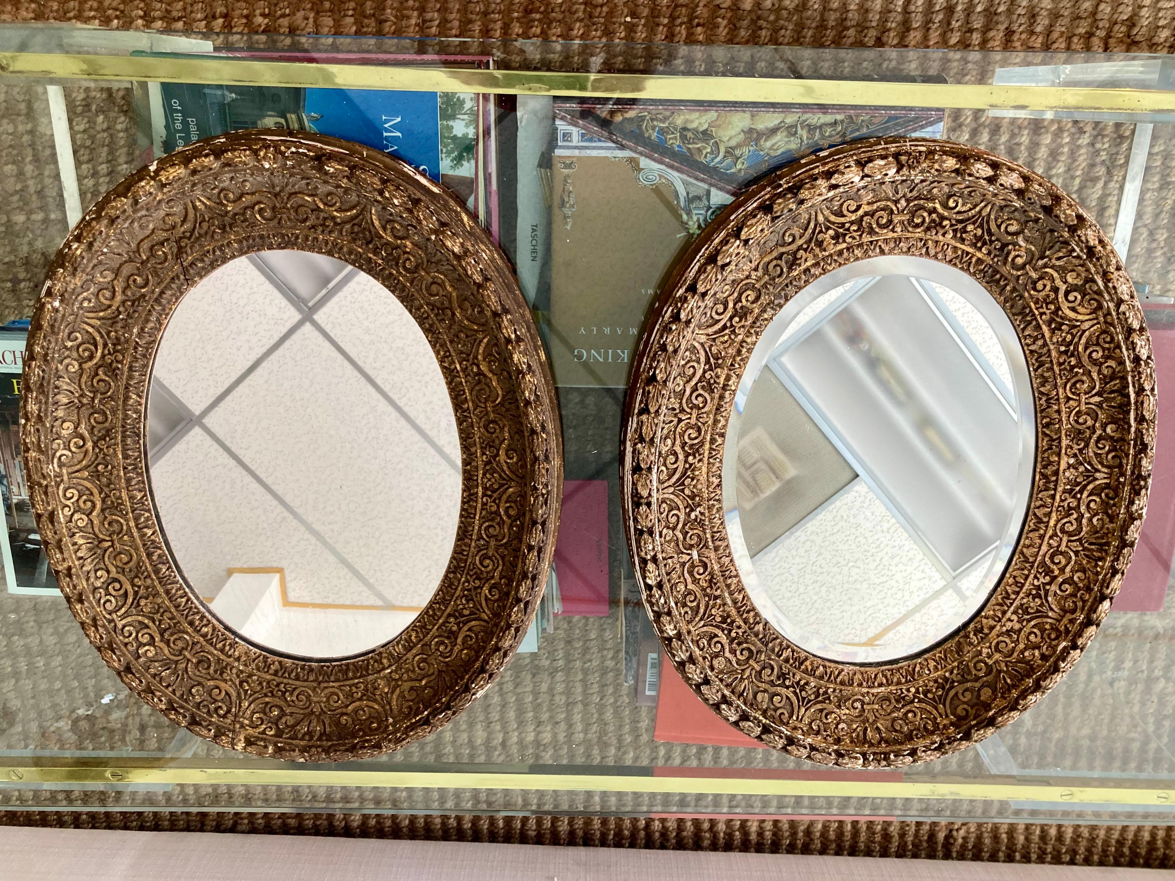 Beautiful pair of French oval mirrors. These are 19th Century and very rare to have a matched pair. Add some French style to your home.