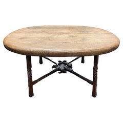 Antique French Oval Oak Coffee Table with Wrought Iron Base