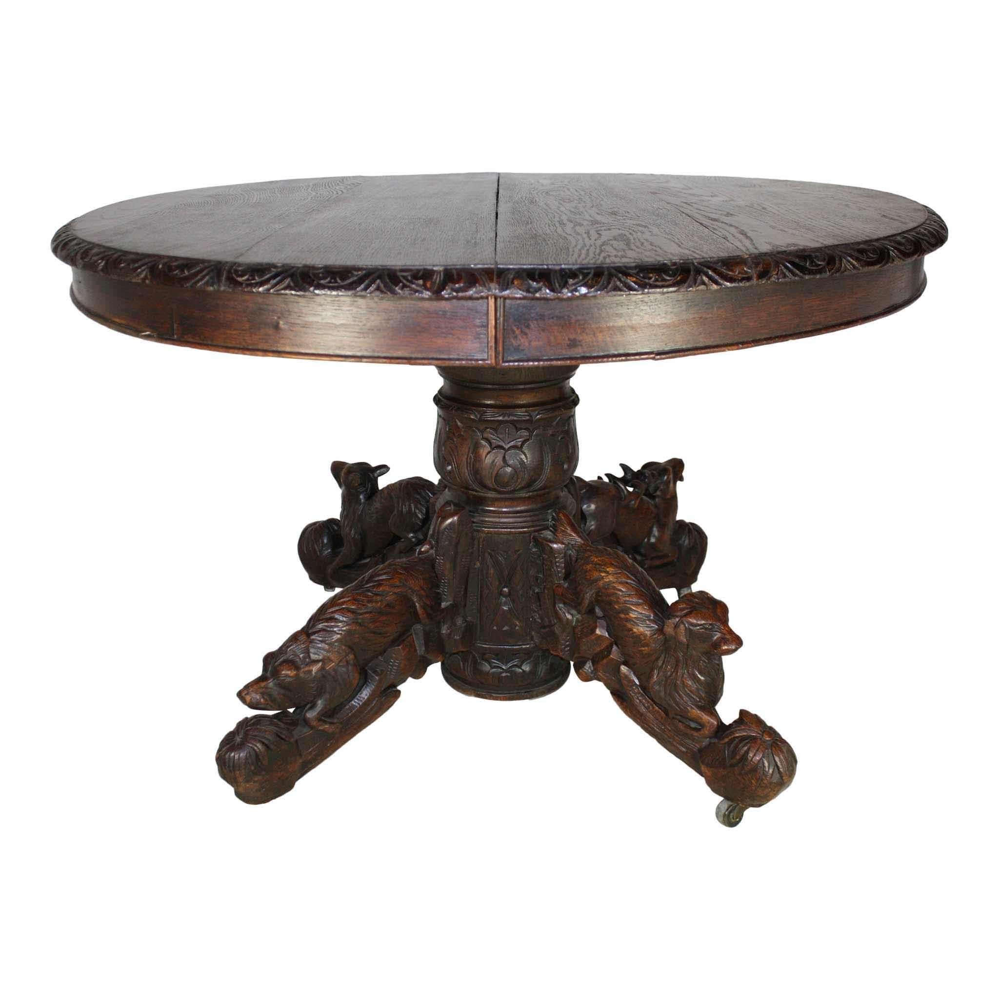 Prized alpine game and the loyal, hunting hound are depicted in detail on the feet of this French hunt table. Each foot has a different animal: stag, fox, boar, and dog. The table appears to have been designed to extend but has since been revised.