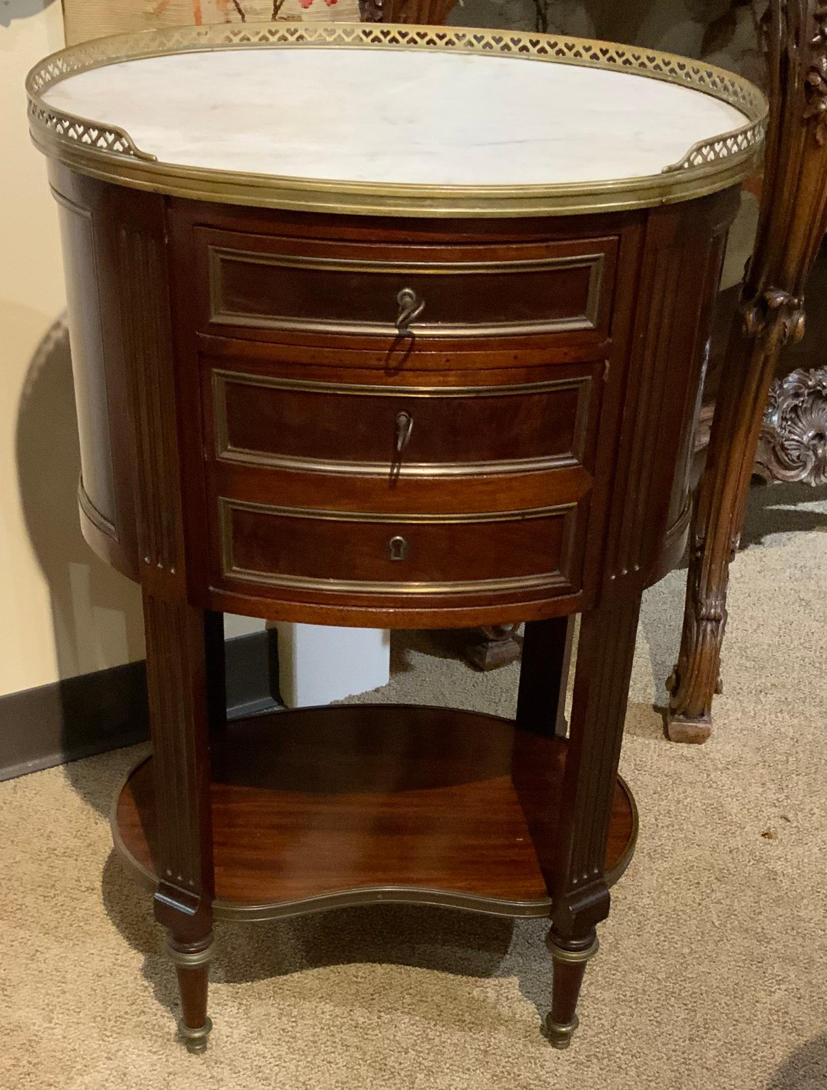 French oval shaped table/ cabinet  mahogany with white marble top, 19 th c. In Excellent Condition In Houston, TX