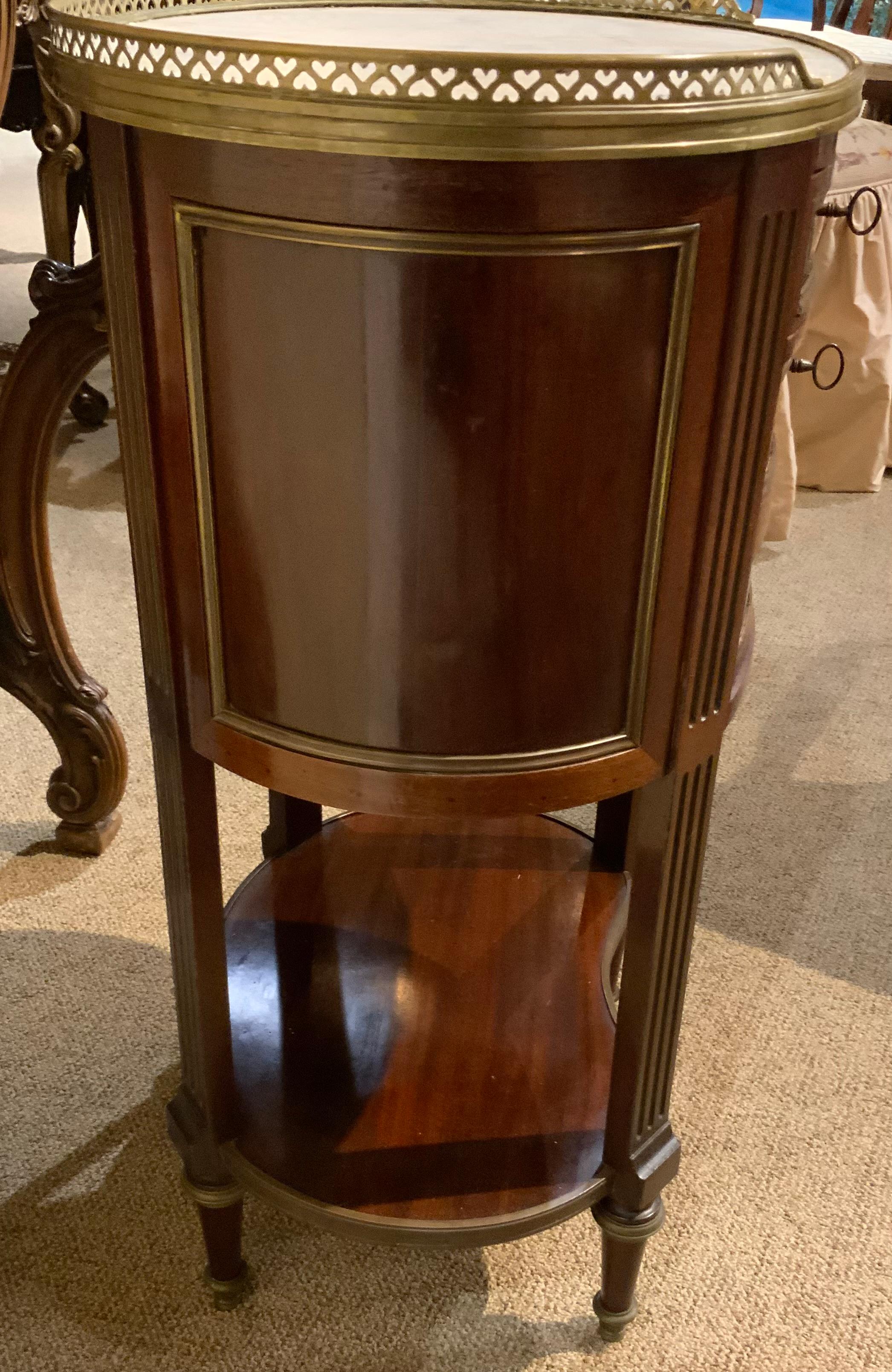 Mahogany French oval shaped table/ cabinet  mahogany with white marble top, 19 th c.