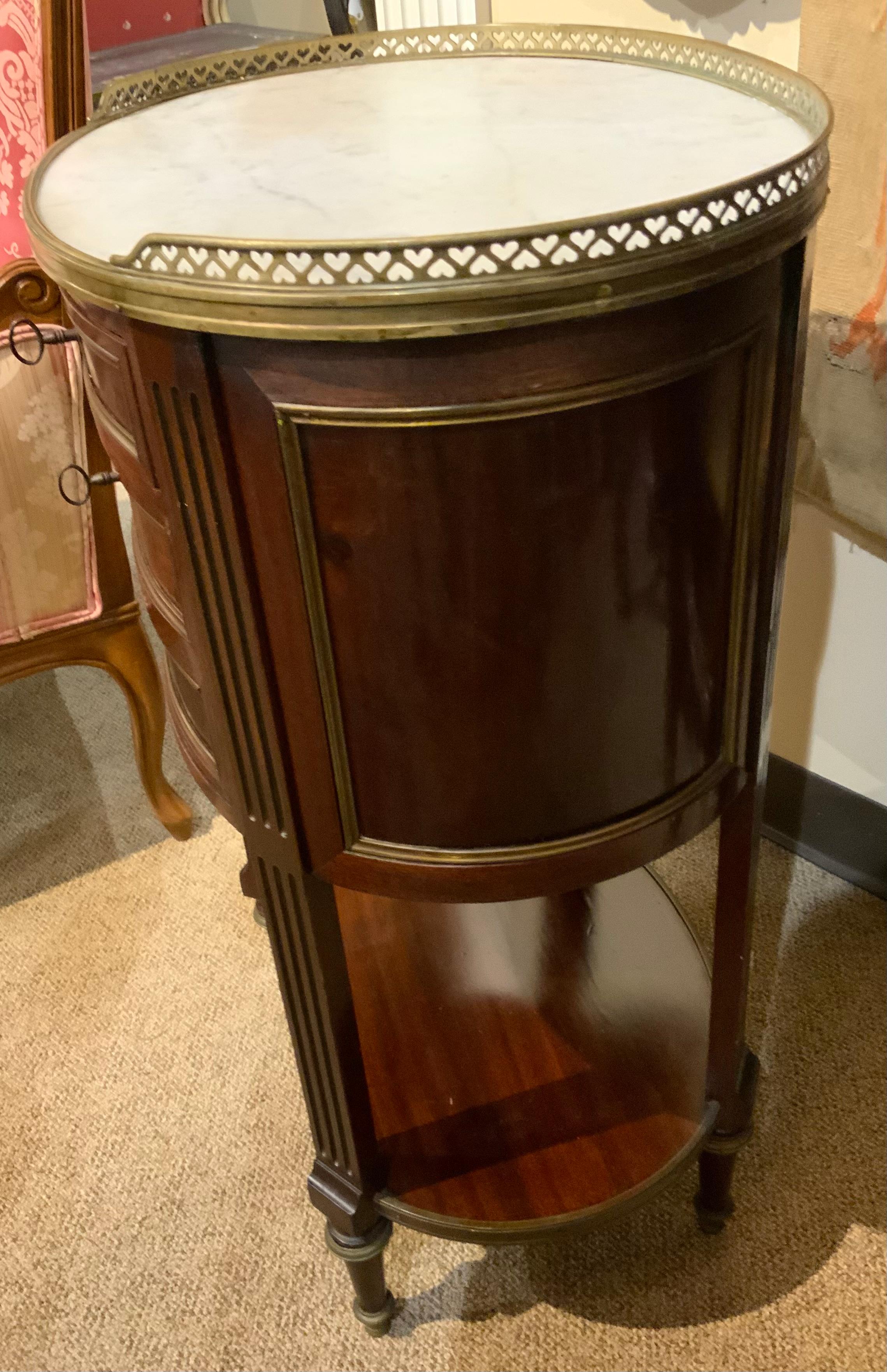 French oval shaped table/ cabinet  mahogany with white marble top, 19 th c. 1