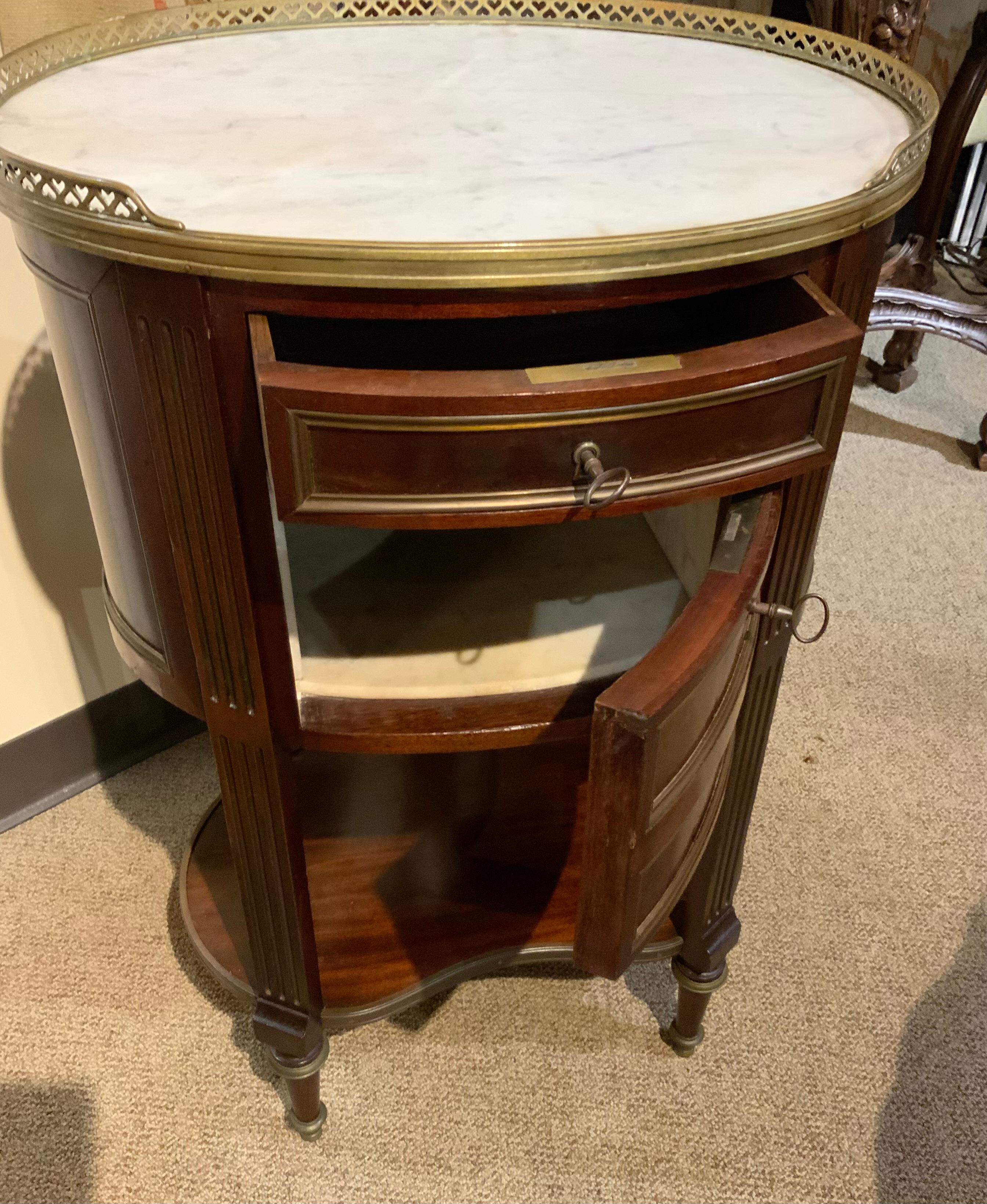 French oval shaped table/ cabinet  mahogany with white marble top, 19 th c. 3