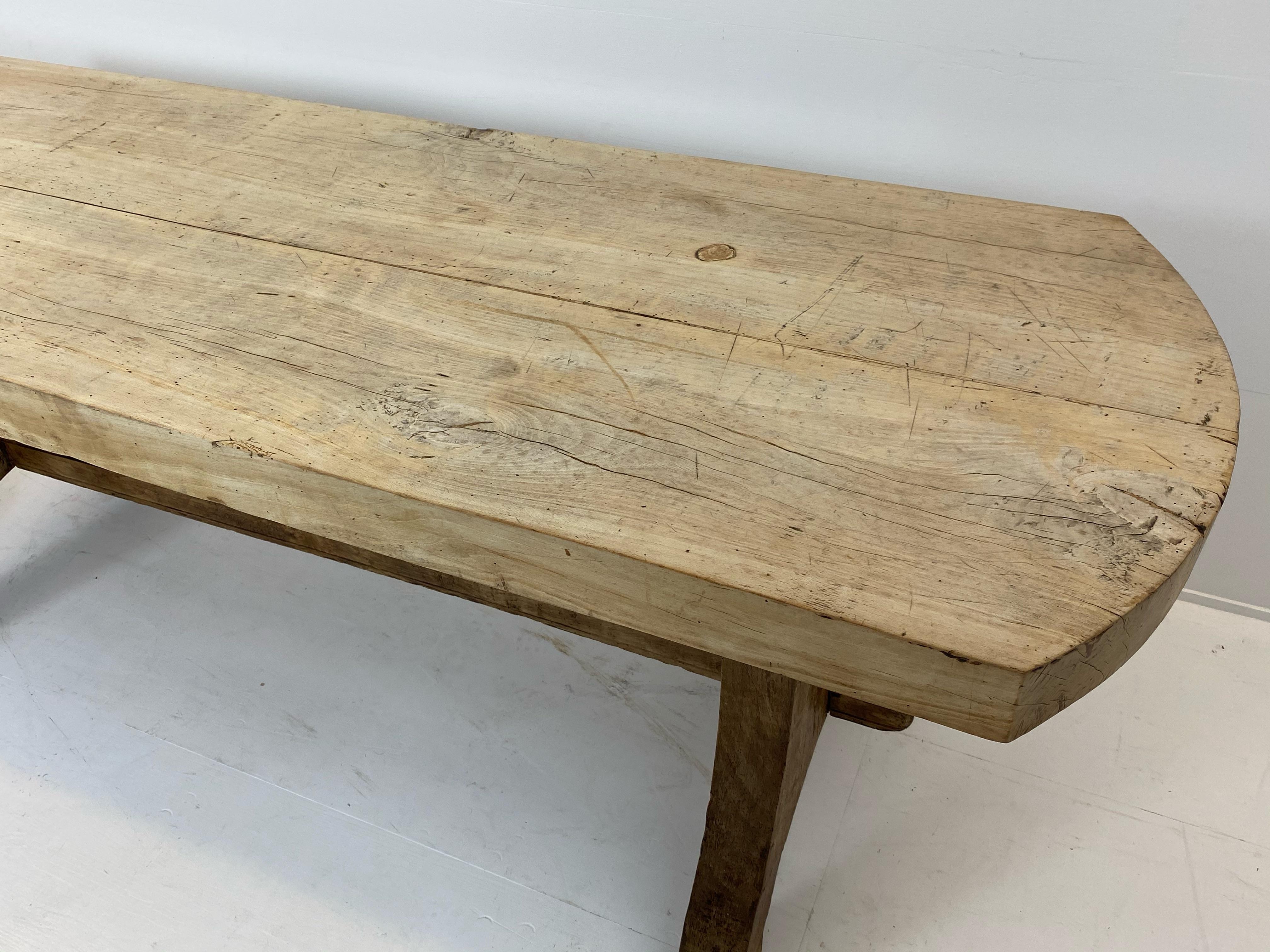 Exceptional Antique French oval table with special, exceptional formed feet, Beechwood,
nice great old bleached patina,
warm and worn blond color of the wood
great to use as a side table in a kitchen but can also be used as a desk or