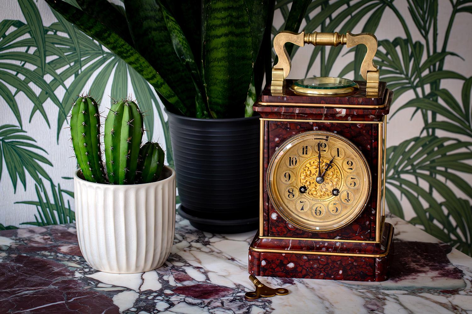 Fantastic French oversized carriage clock compendium. The carriage clock carved out of red (rouge) marble with a wide foot having a cavetto step with quadrant brass edging with an opposing matching top. The clock with an industrial oversized handle