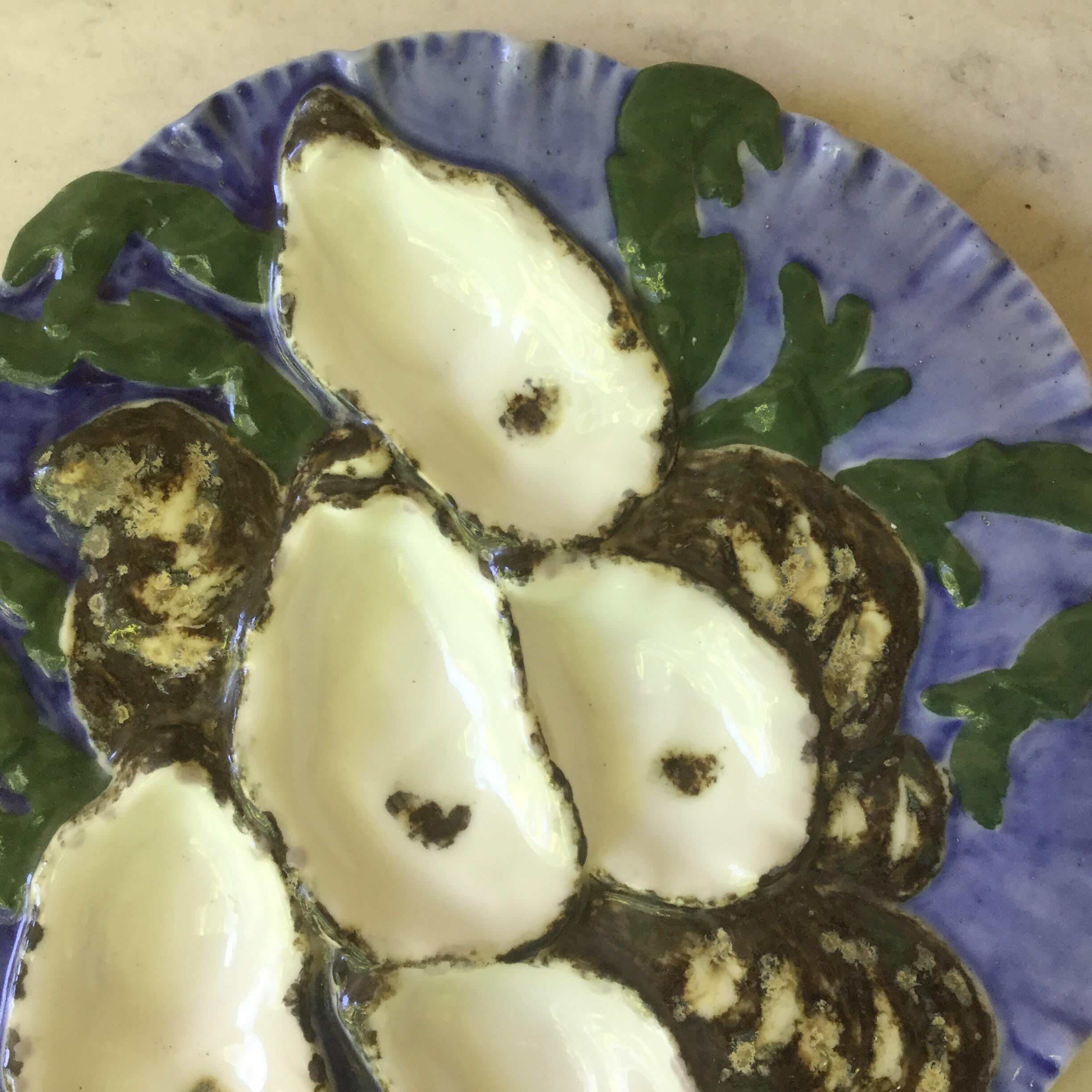 Antique 19th century French porcelain oyster plate with the turkey pattern signed Limoges Haviland.