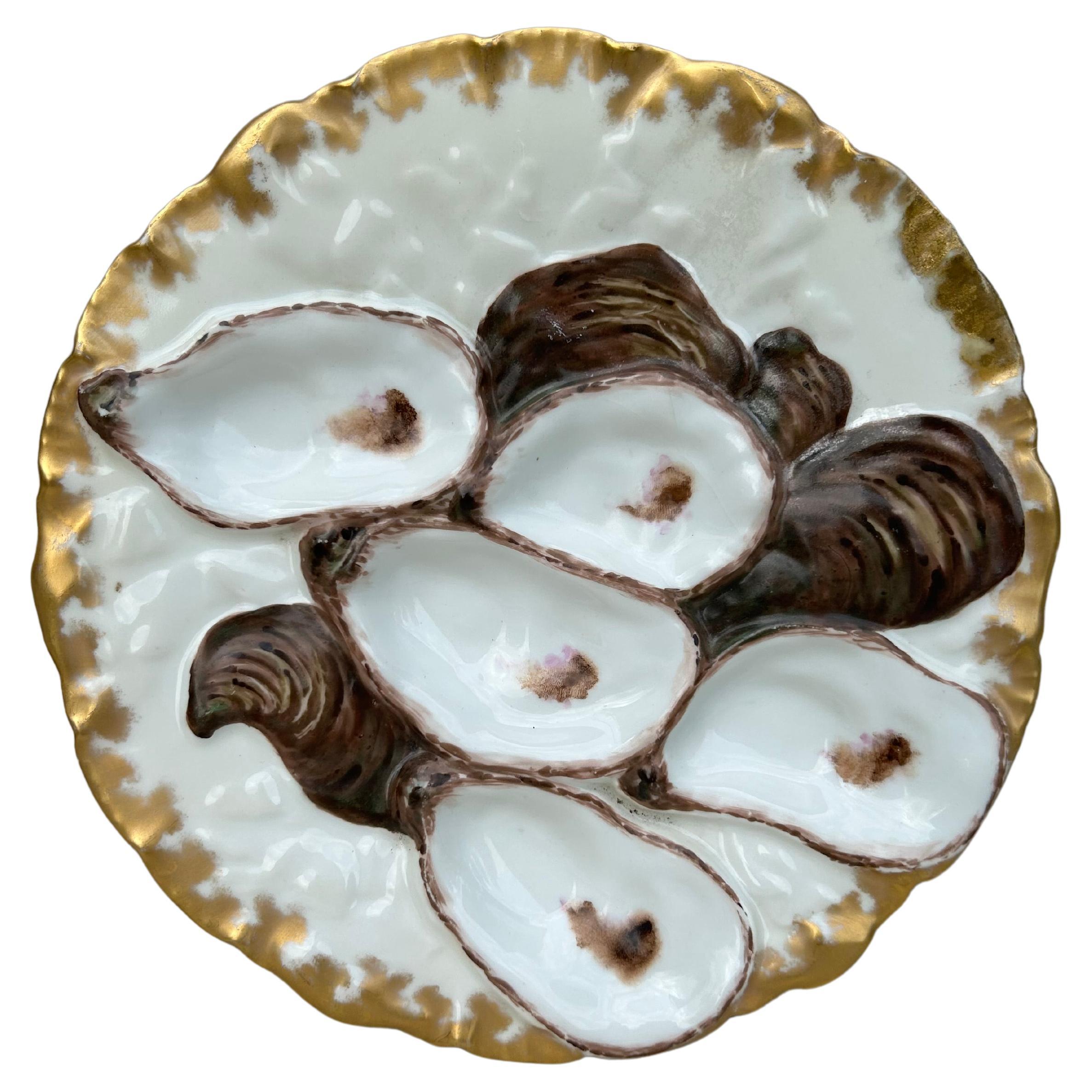 Antique 19th Century French porcelain oyster plate with the turkey pattern signed Limoges Haviland.