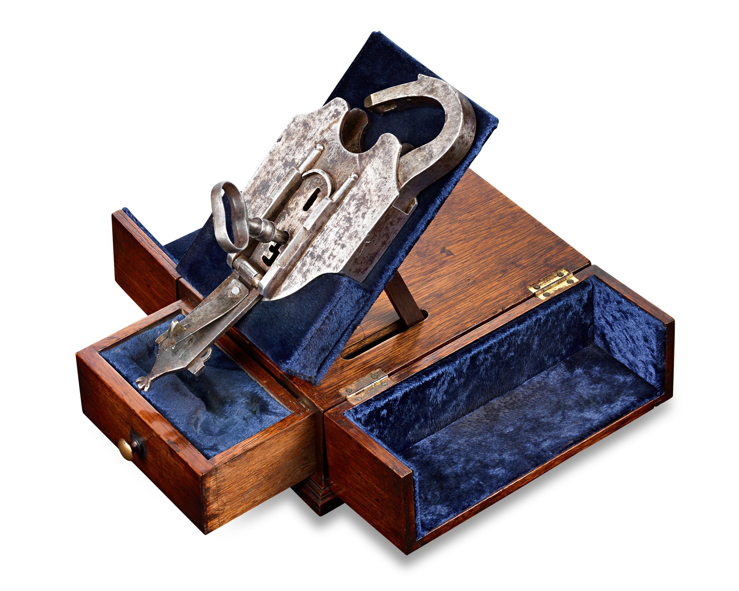 Padlock
Circa 1800

A marvel of mechanical complexity and exceptional craftsmanship, this French padlock was one of the most unique means by which valuables could be safely stored in the 19th century. While it may appear straightforward at first
