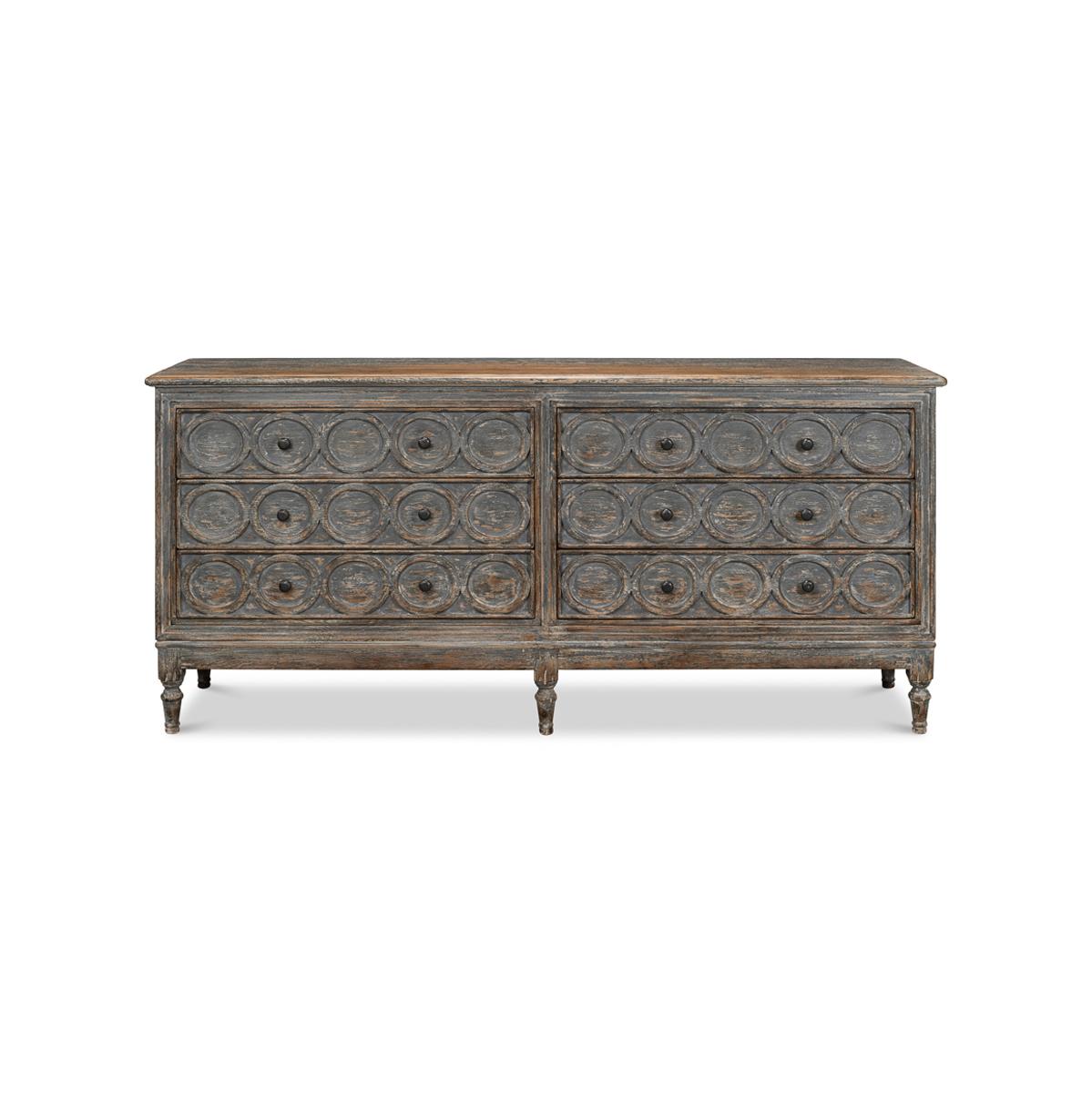 A six-drawer dresser that is highly distressed with circle motif's interlaced on the drawer fronts. Raised on size turned and tapered legs.

Dimensions: 80