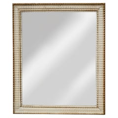 Miroir français peint et partiellement doré avec cadre moulé texturé, vers 1940