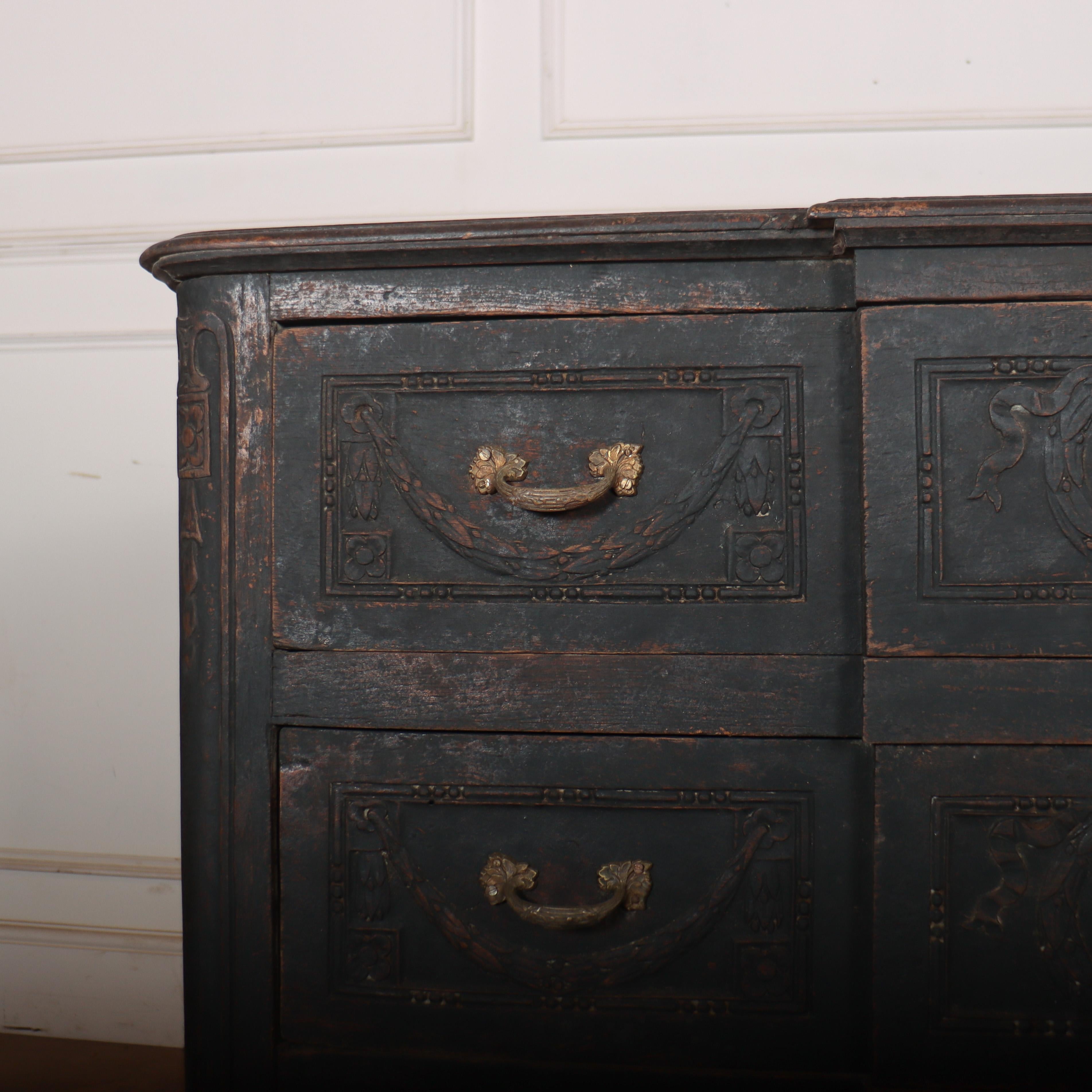 Stunning early 19th century French painted oak breakfront commode with good carved details. 1820.

Code: 8682

Dimensions:
W: 44.5