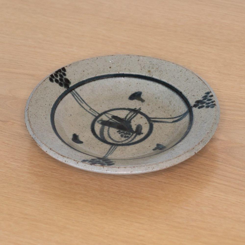 Beautiful ceramic dish from France, 1960s. Plate with grey glaze and blue painted motif. Stamped on bottom. Great as catch-all or to be hung on the wall as art.
 