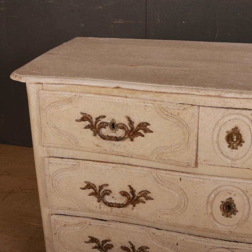 18th century painted French 5-drawer commode, 1760

Dimensions:
50 inches (127 cms) wide
22 inches (56 cms) deep
31 inches (79 cms) high.

   