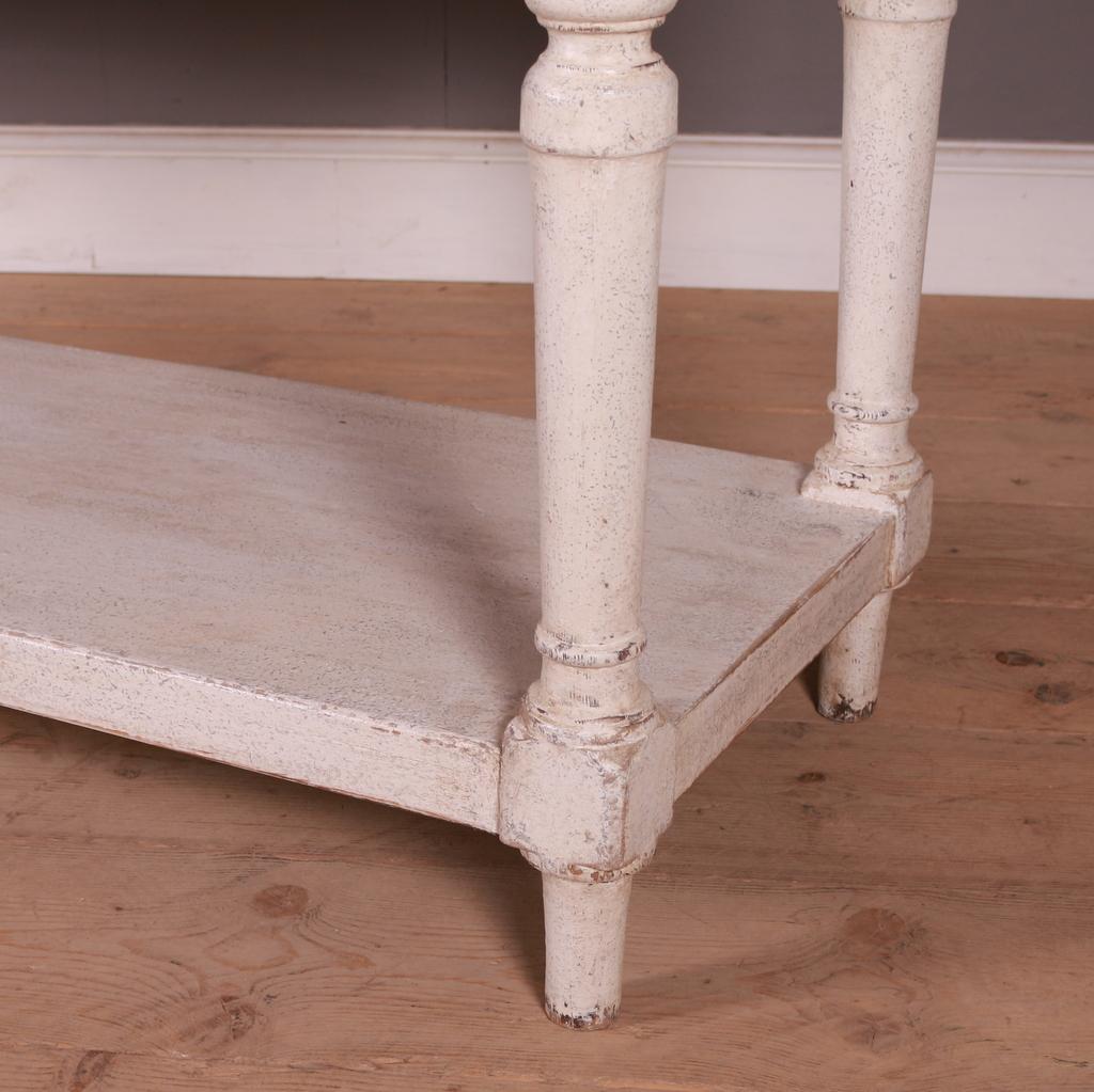 Long and narrow 5 drawer painted console table. 1870.

Dimensions
99 inches (251 cms) Wide
24 inches (61 cms) Deep
31.5 inches (80 cms) High.

 