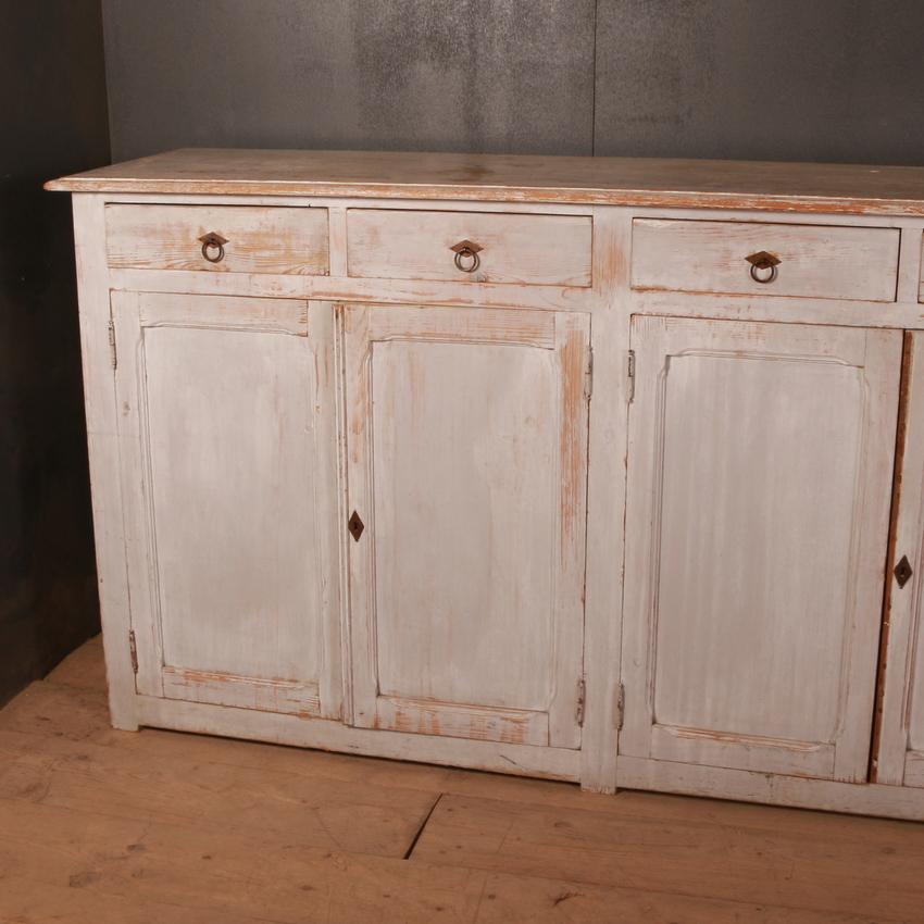 Large narrow 19th century French painted enfilade/ sideboard, 1890

Dimensions:
108.5 inches (276 cms) wide
20.5 inches (52 cms) deep
40 inches (102 cms) high.

   