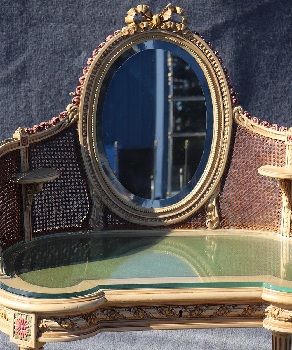 This is the quintessential French ladies vanity and has been decadently carved with gorgeous roses and beautiful design. The chair is damaged but, you can make a cushion easily enough with some fabric and pre-cut piece of wood. Focus on the tilting