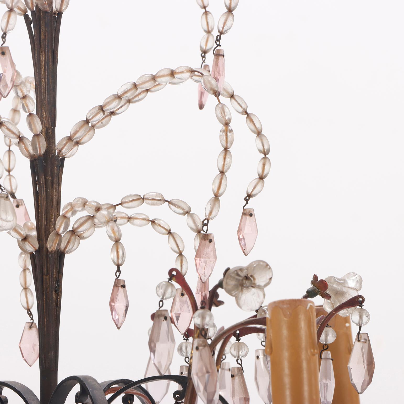 Français Lustre en fer peint et perles à la manière de Bagues C.C. 1940. en vente