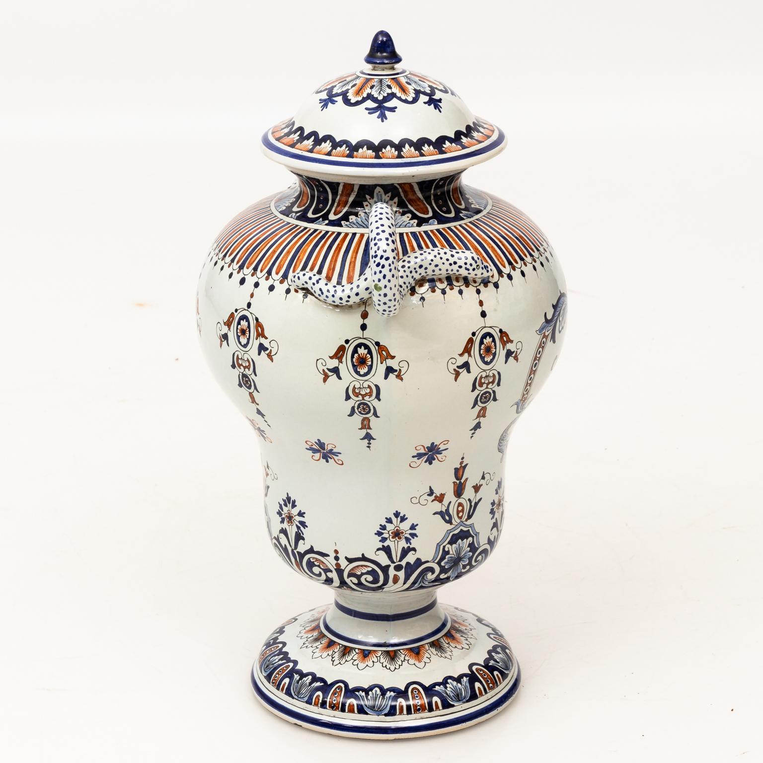 French covered jar with painted detail that features coiled snakes as handles and a custom label for 