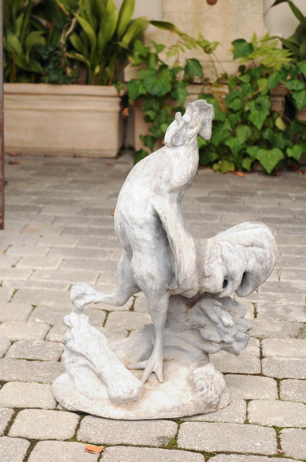 A French lifesize painted lead crowing rooster sculpture from the first half of the 20th century. Famous for being the French national emblem, our rooster is standing proudly on a base adorned with a bundle of wheat. We seem to have caught the