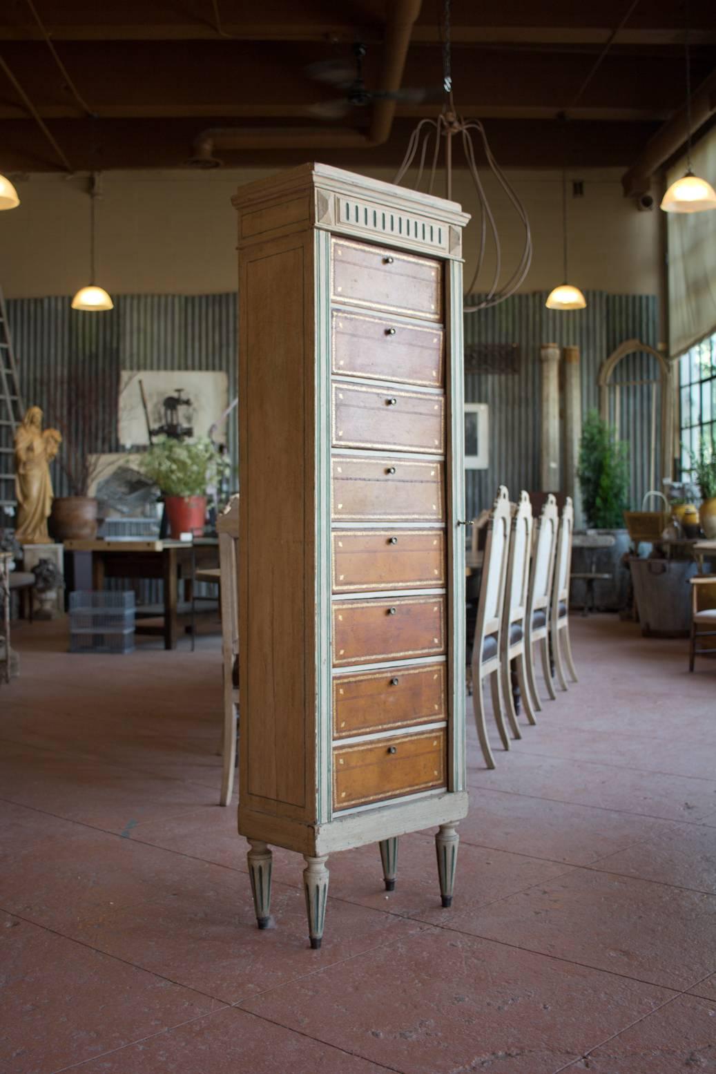 Carved and painted eight-drawer dockside lingerie chest.